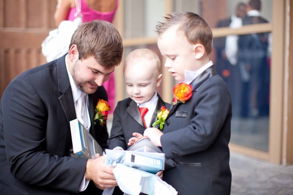 groom hanging with ring bearers