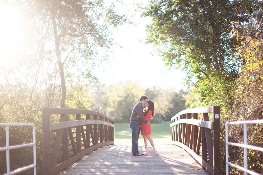 kissing on a bridge