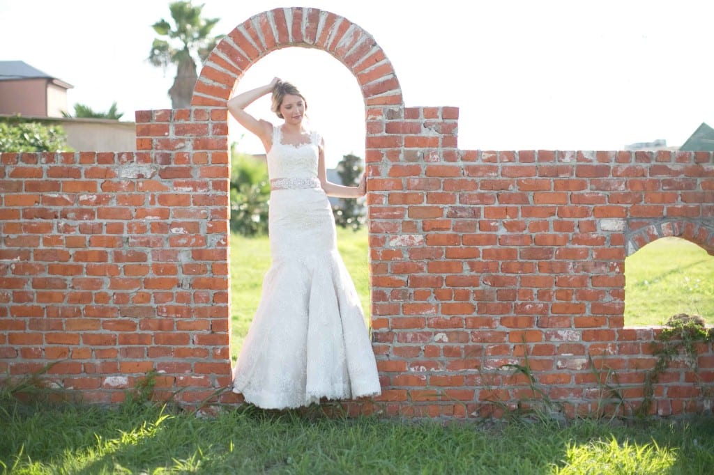 bride in an arch