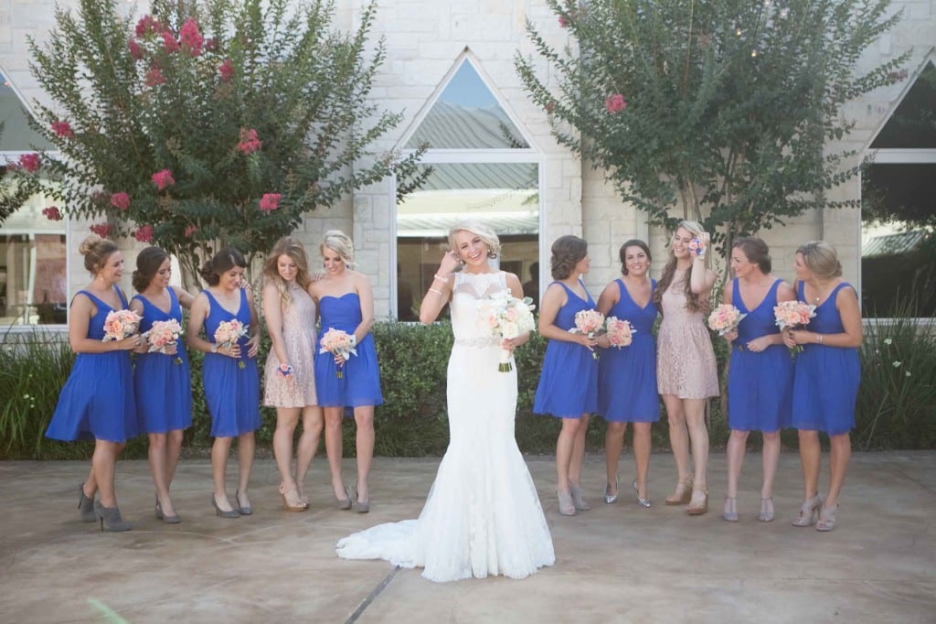 happy bride and blue bridesmaids
