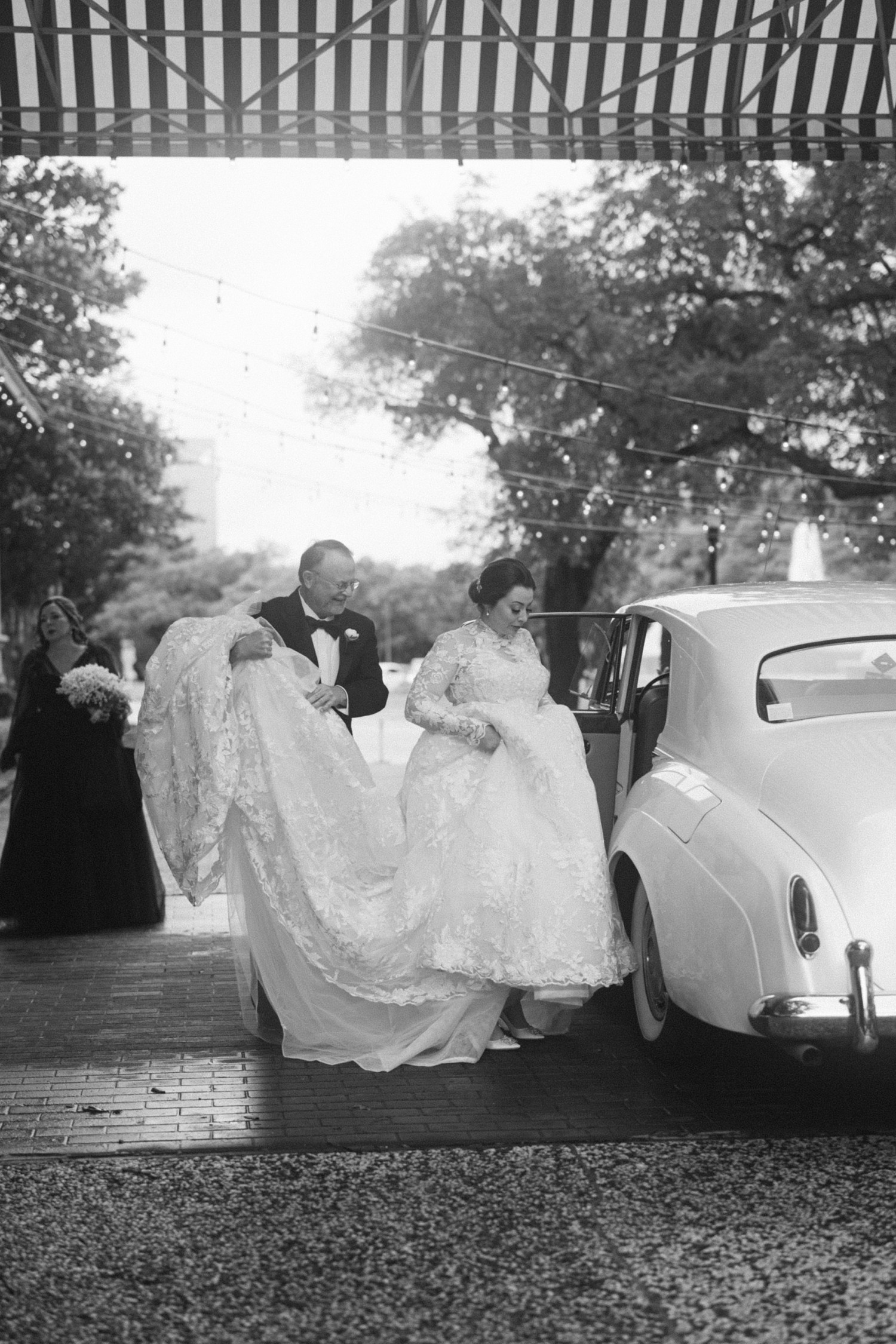 Bride with Dad Getting Into Car