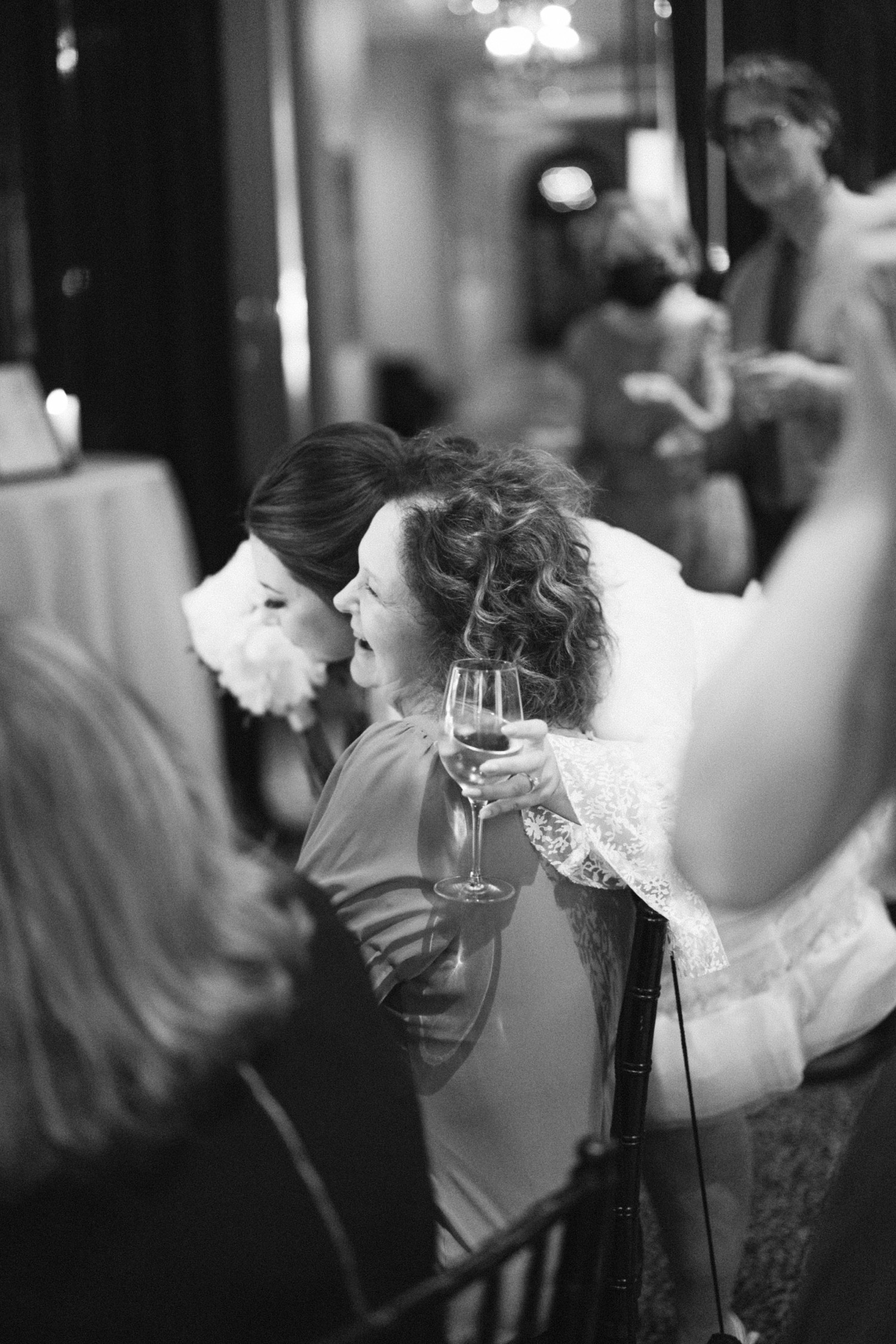 Bride Hugging Family 