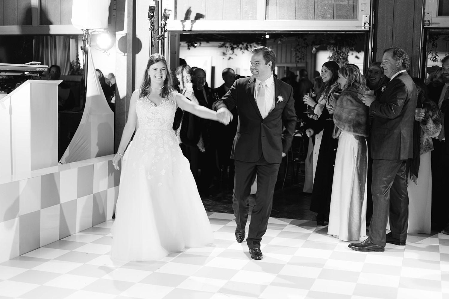 Bride and Groom Entering Wedding Reception