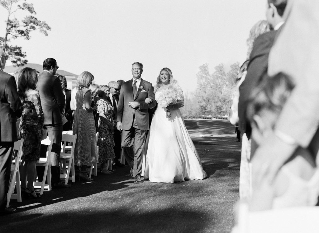 Bride and Father Walking down aisle