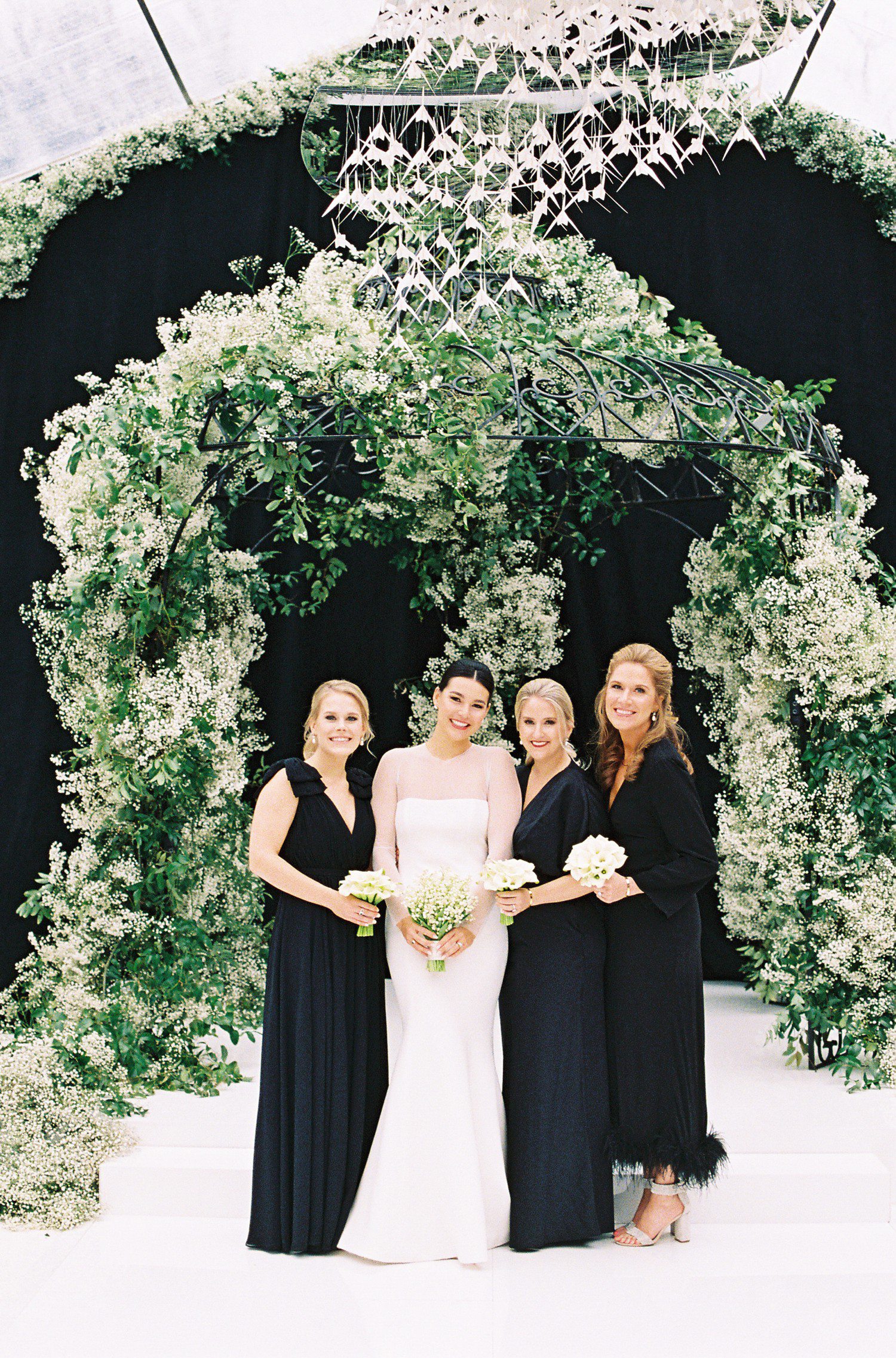Bride with Bridesmaids in Black Dresses