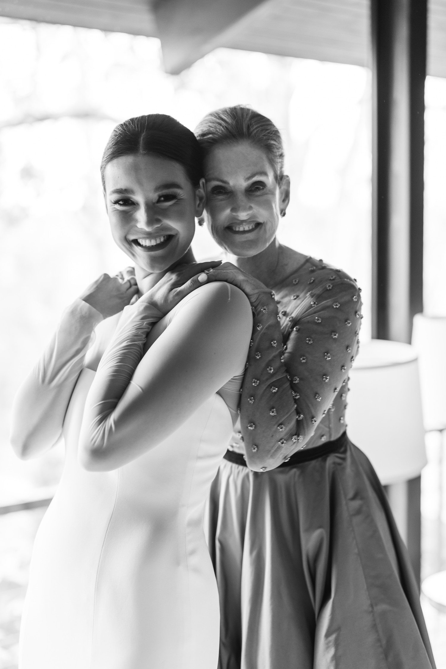 Bride and Mom smiling 