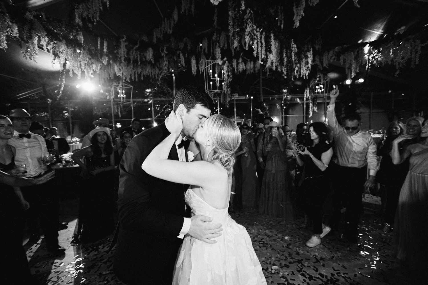 Bride and Groom kiss during wedding reception