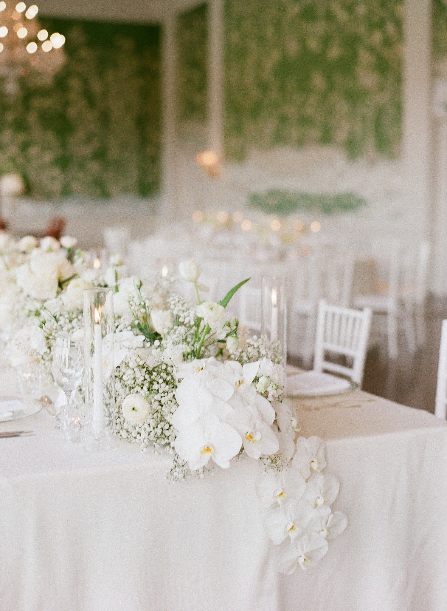 White Orchids and Baby's Breath Wedding Tablescape Flowers 