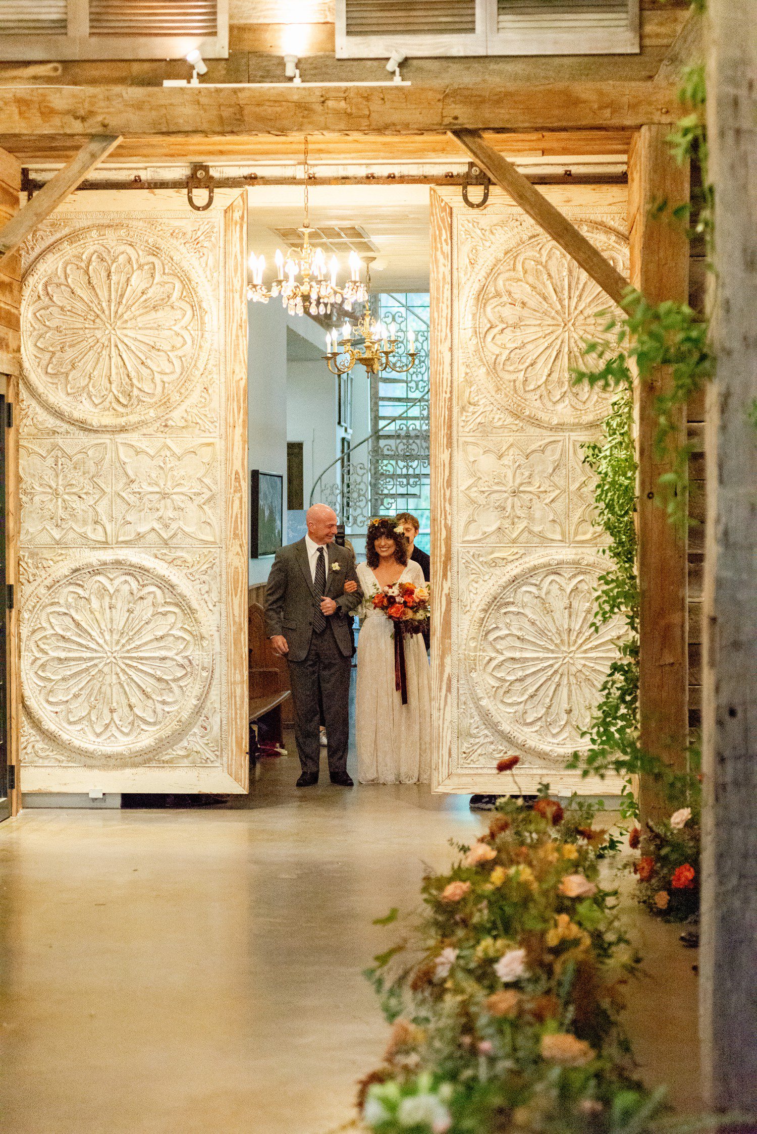 Bride and Father walking down wedding aisle