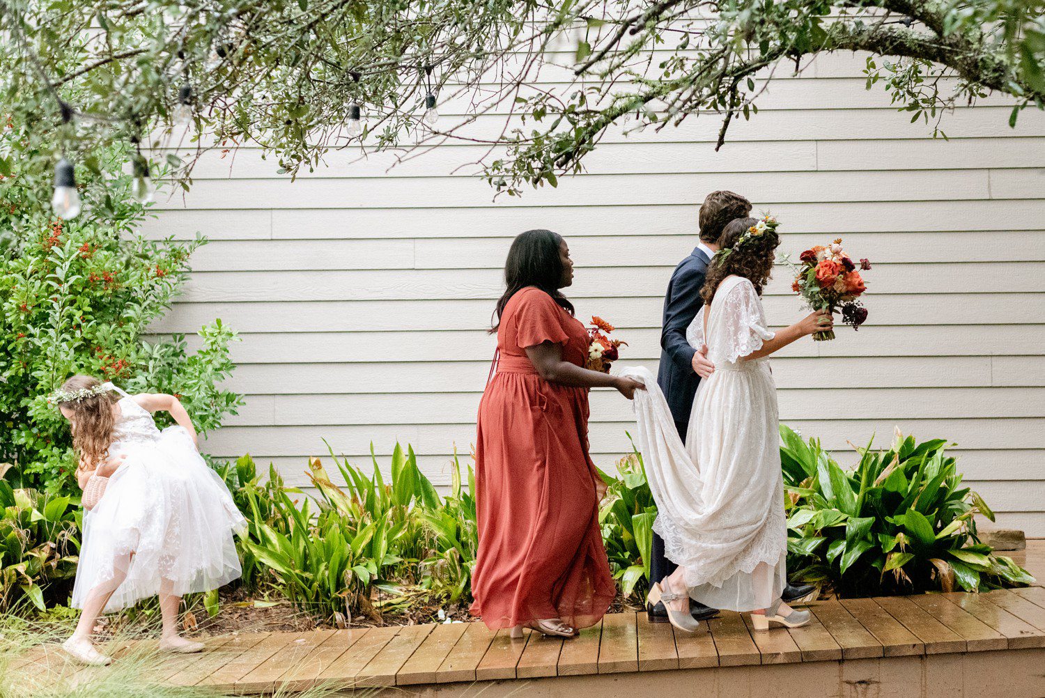 Bride and Groom walking to wedding reception