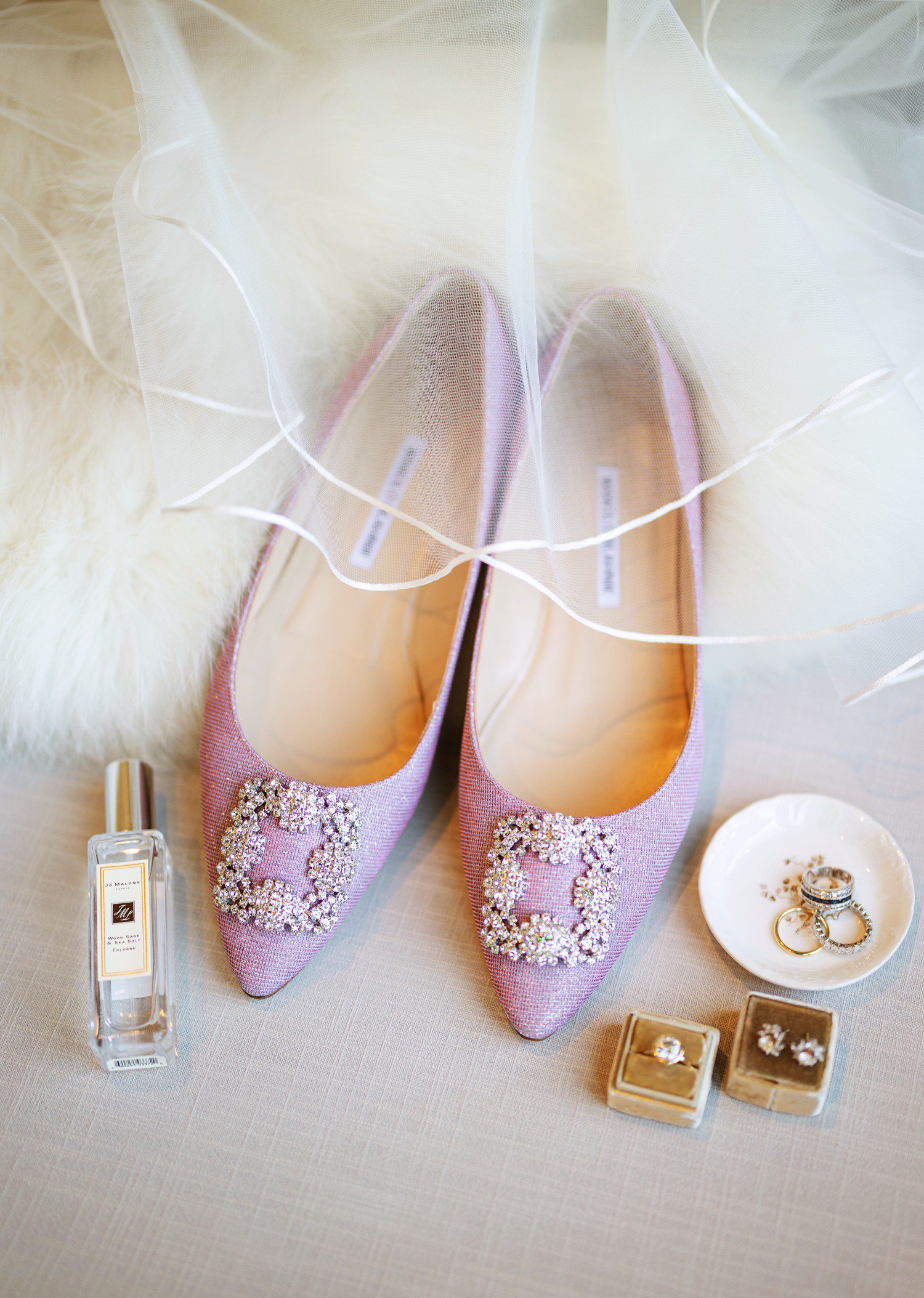 Bride wedding details with pink Manolo Blahnik shoes