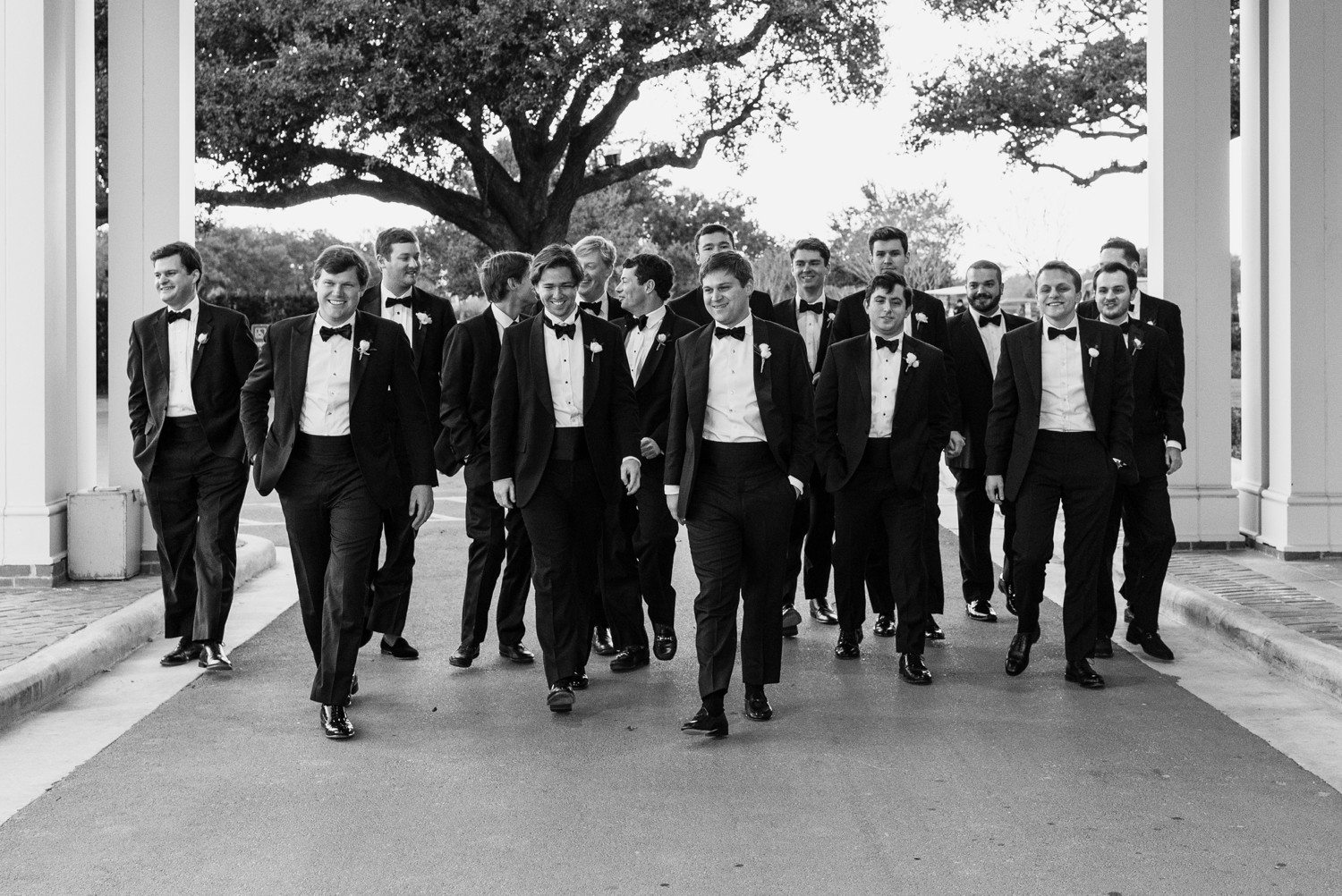 Groomsmen walking at Houston Country Club 