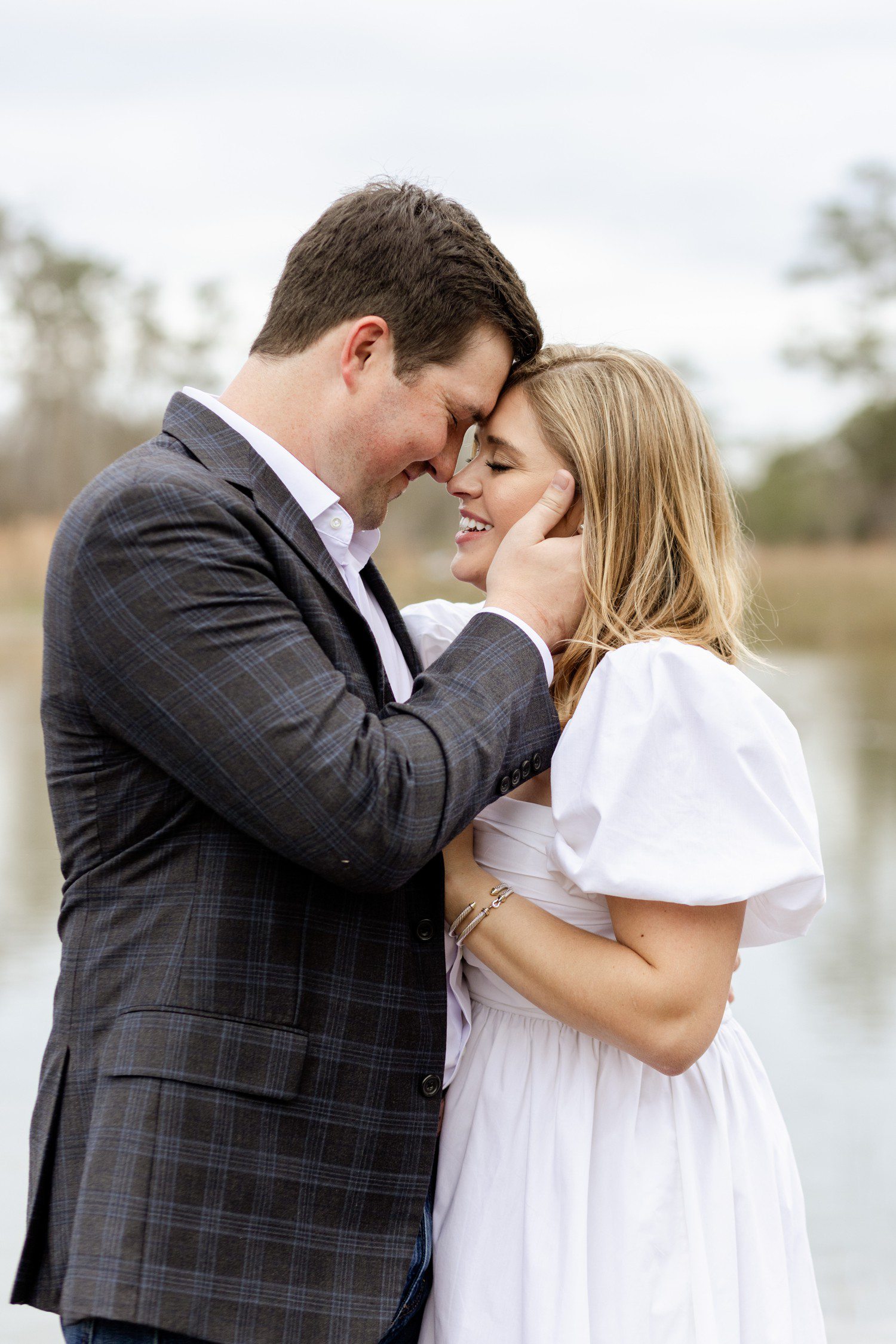 Engagement photos with couple forehead to forehead in Houston. 