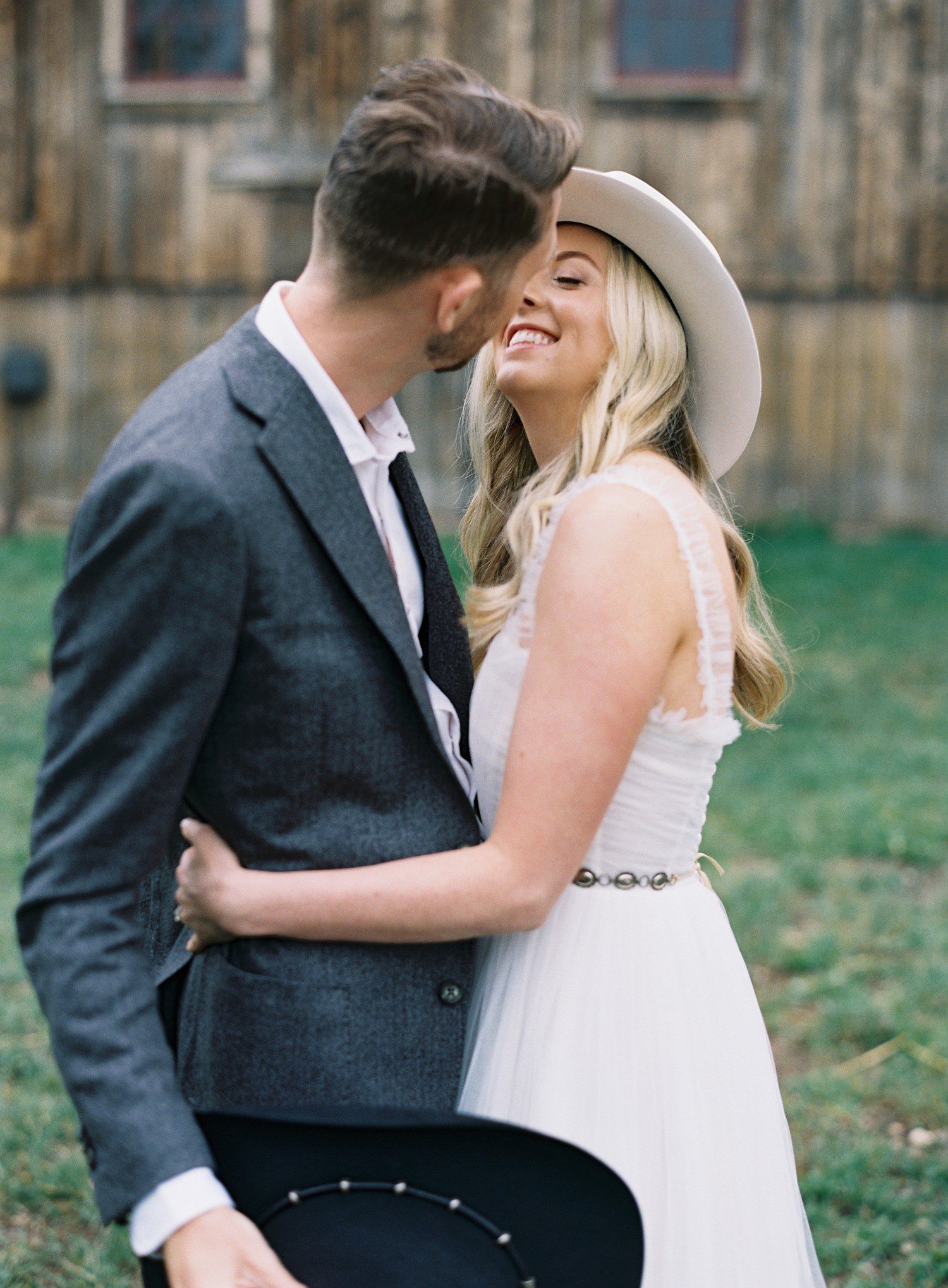 Bride and groom wedding rehearsal outfits in Aspen. 