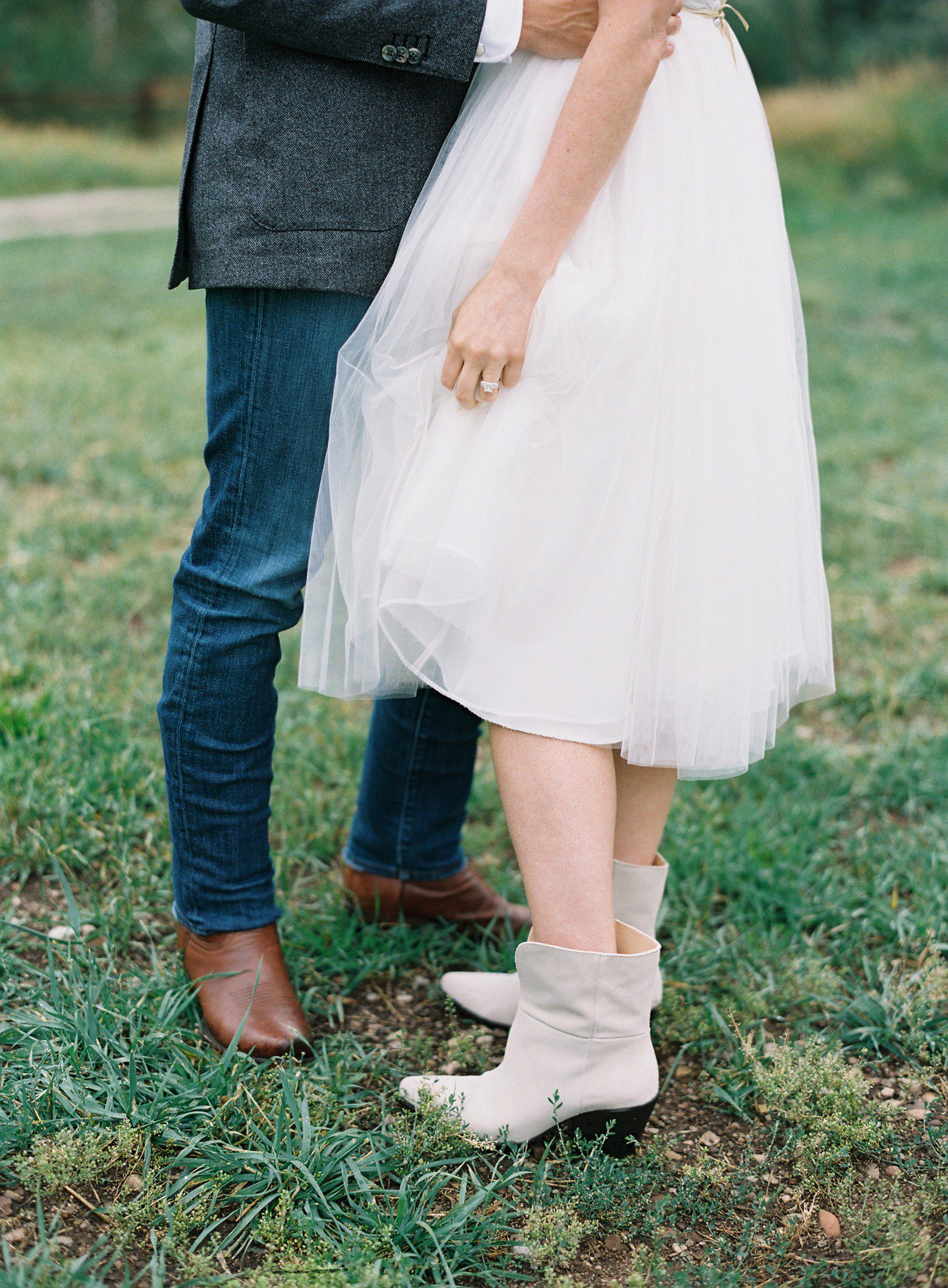 Bride and groom wedding rehearsal outfits in Aspen. 