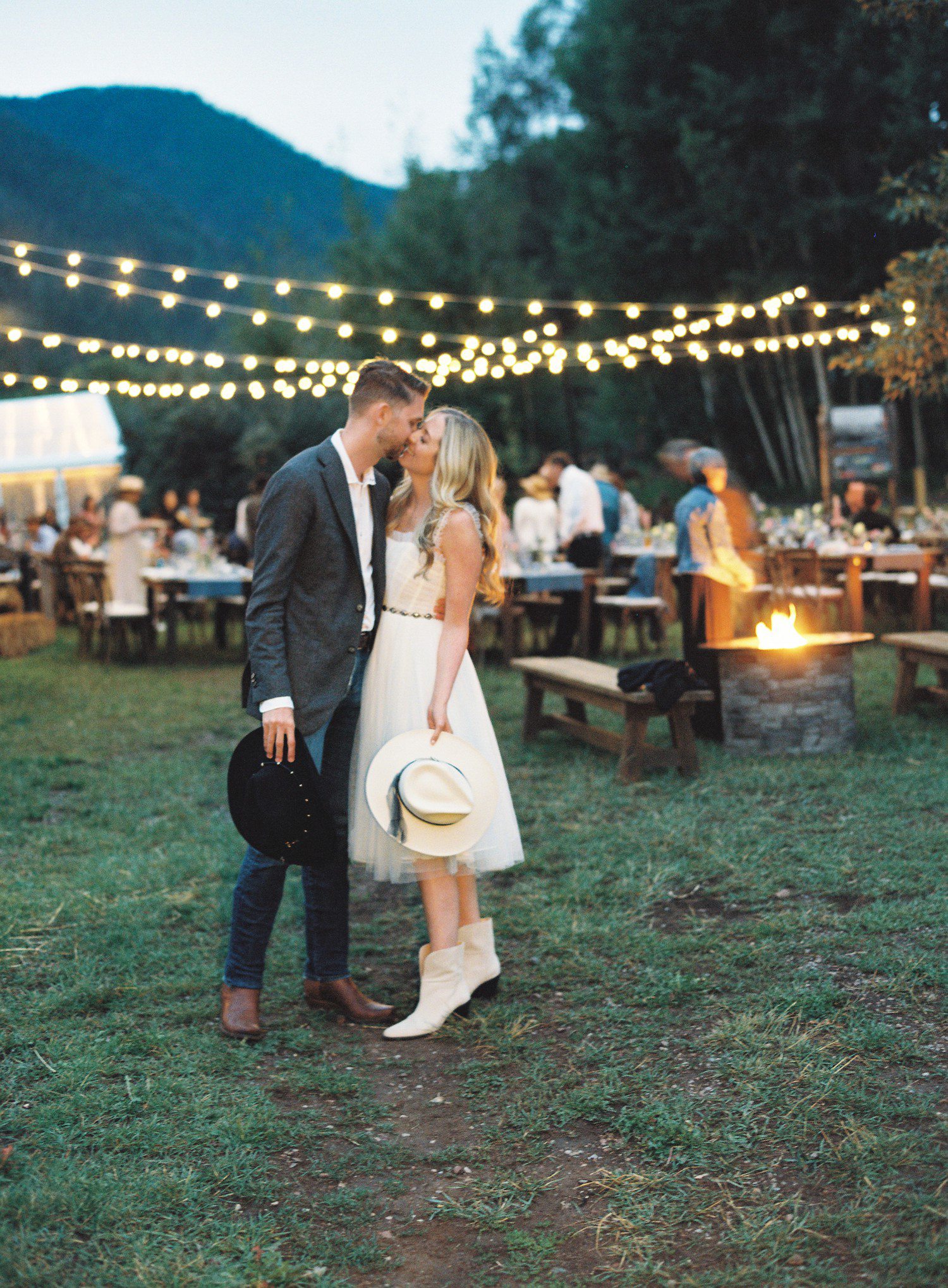 Bride and groom at wedding rehearsal dinner in Aspen. 