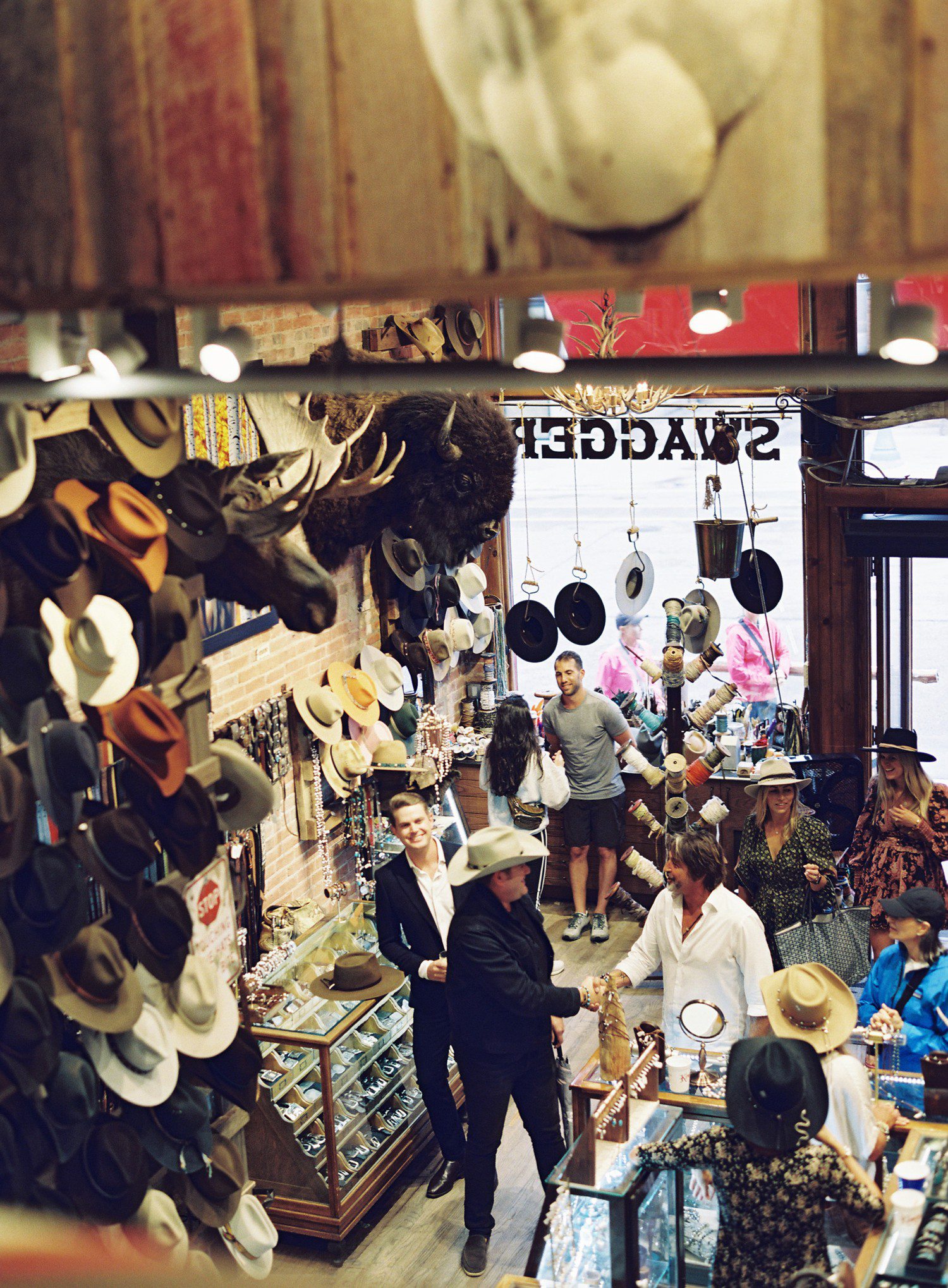 Wedding guests browsing Kemo Sabe in Aspen. 