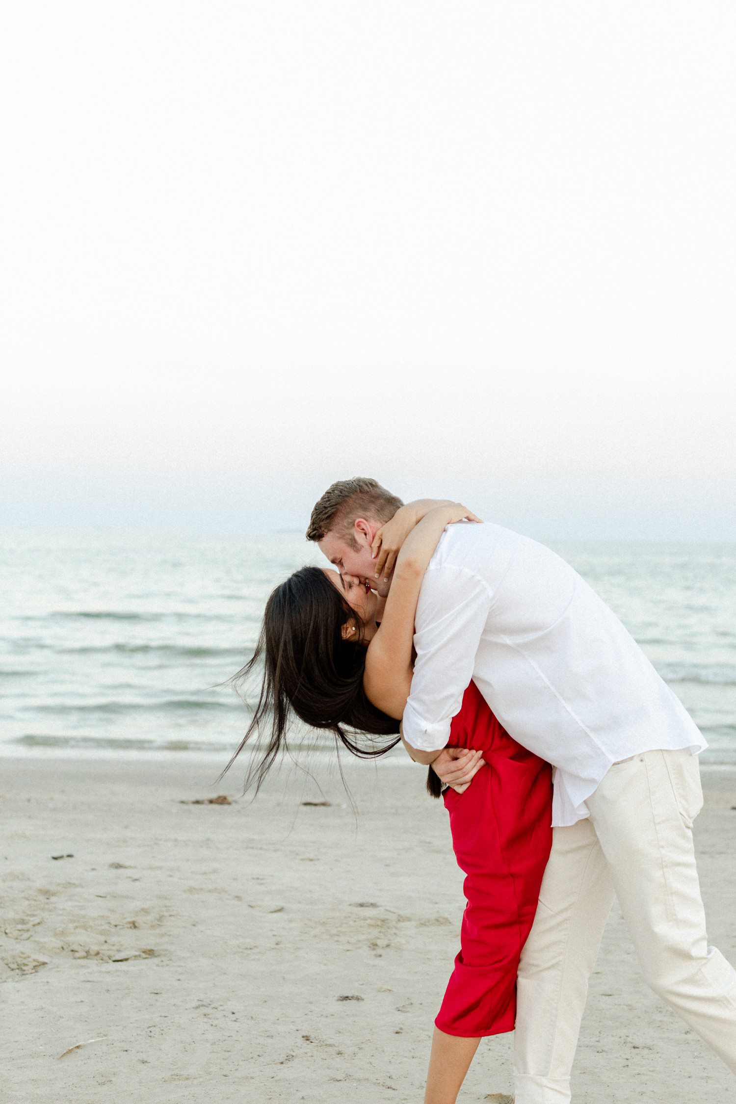 Engagement photos on the beach in Galveston, TX. 