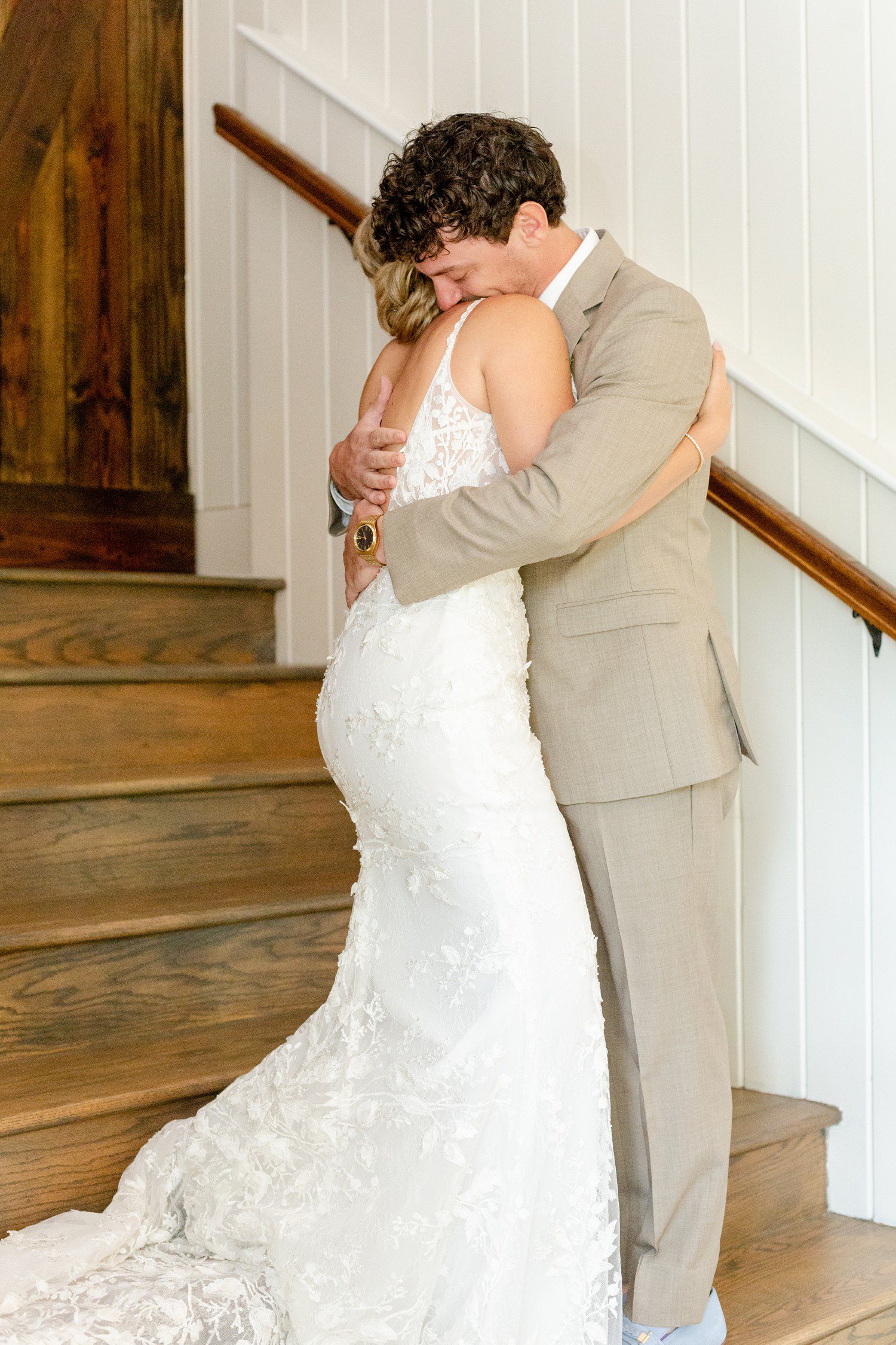 Bride and groom hugging after first look at Sendera Springs.