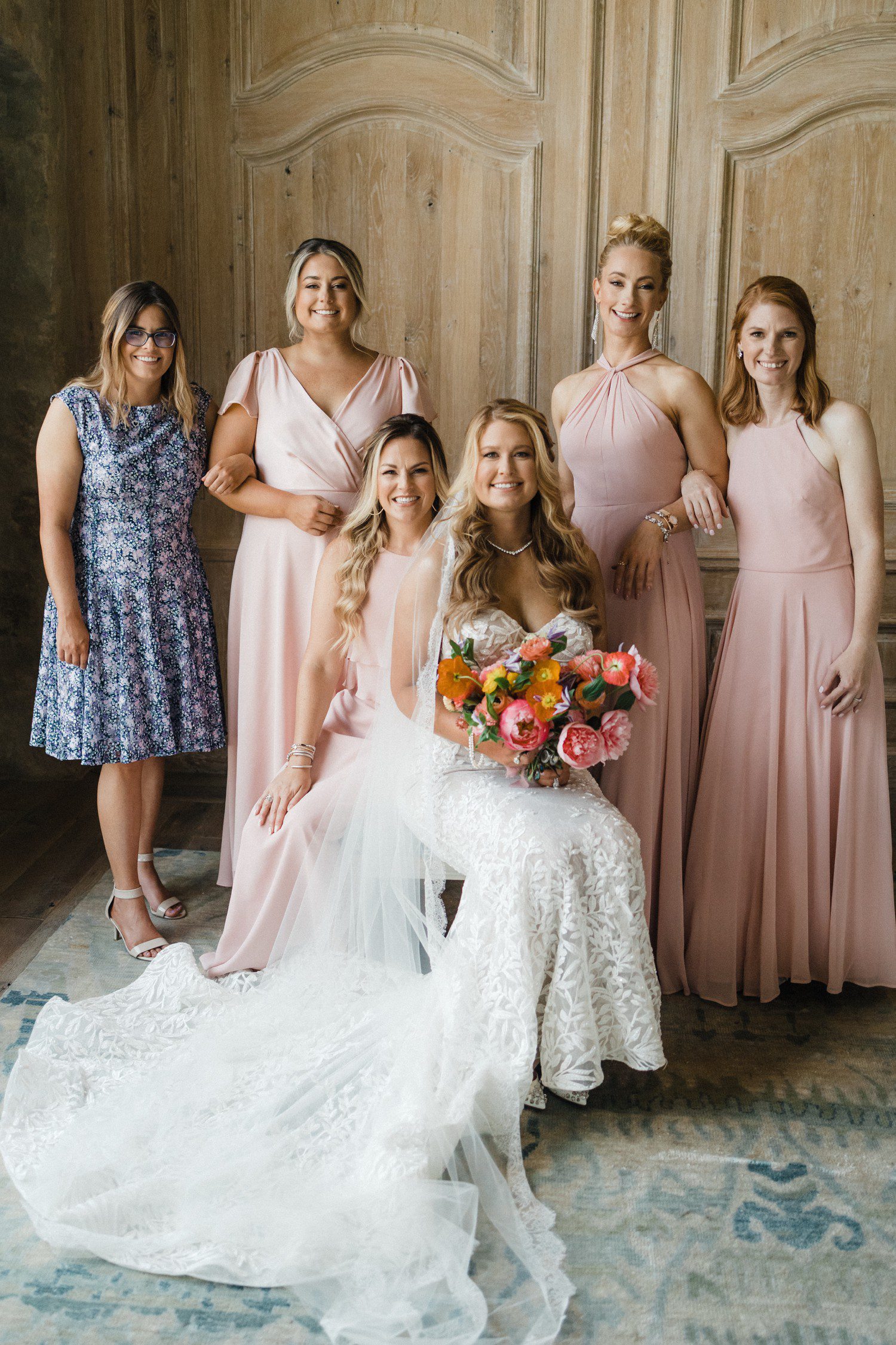 Bride and bridesmaid photos in pink dresses.