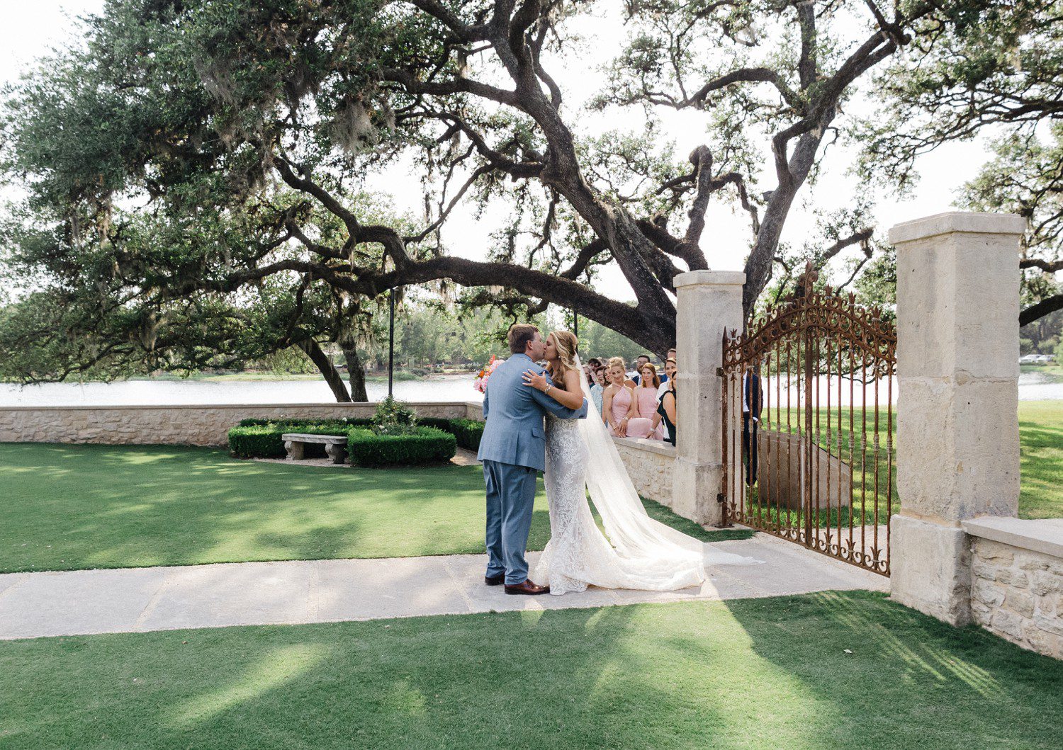 Wedding first look in the courtyard of the clubs at Houston Oaks. 