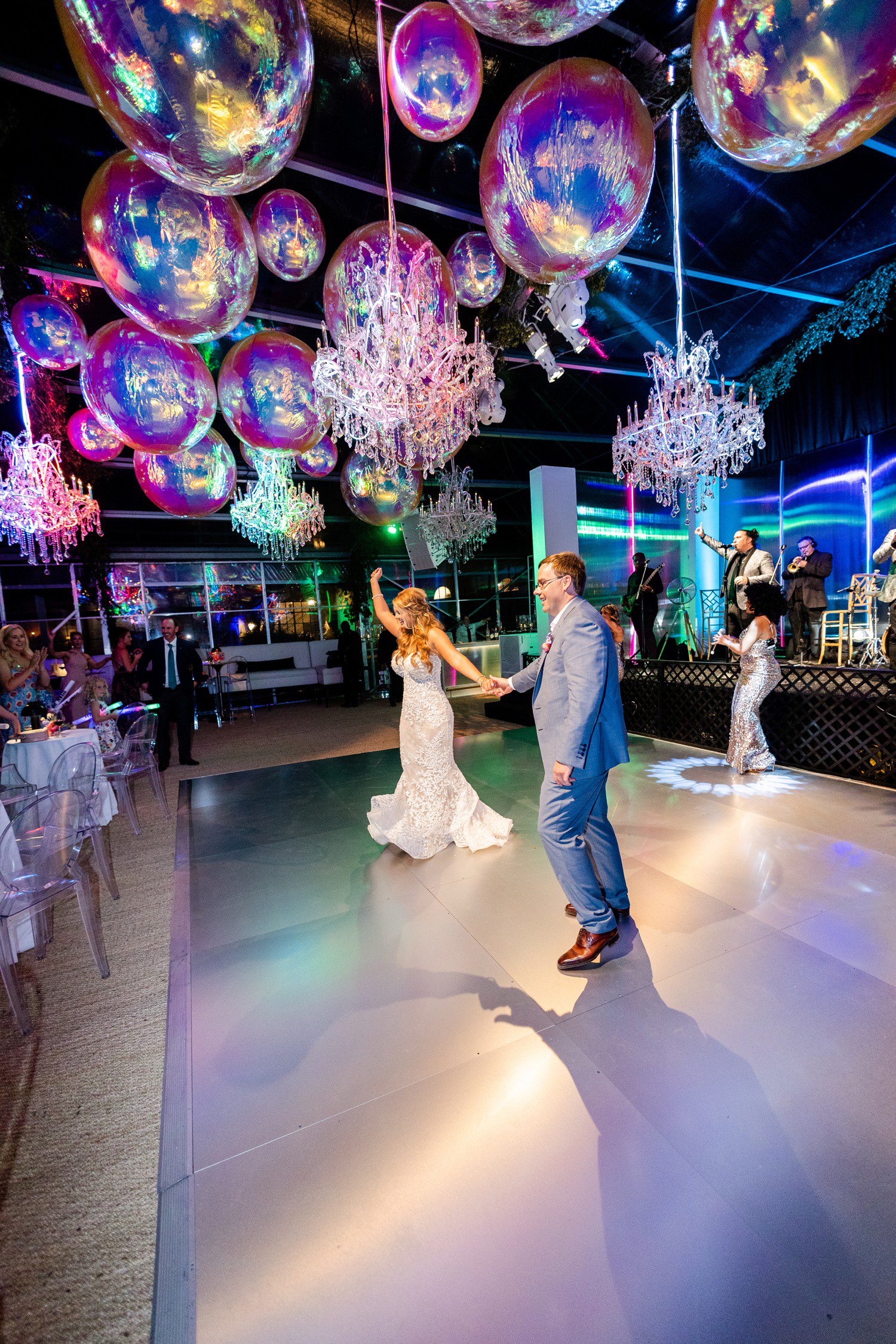 Bride and groom dancing during wedding reception at Houston Oaks. 