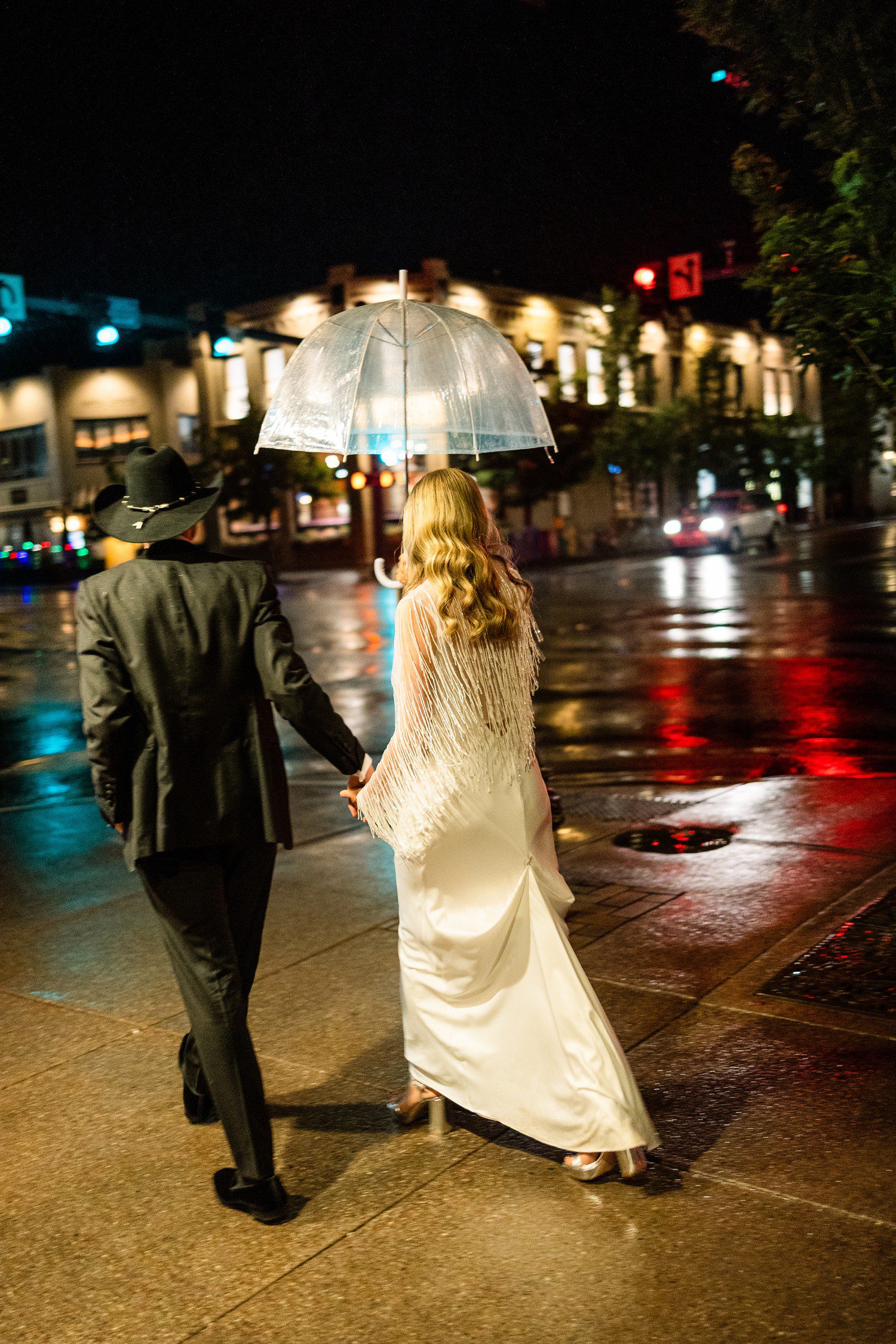 Bride and groom walking to after party in Aspen. 