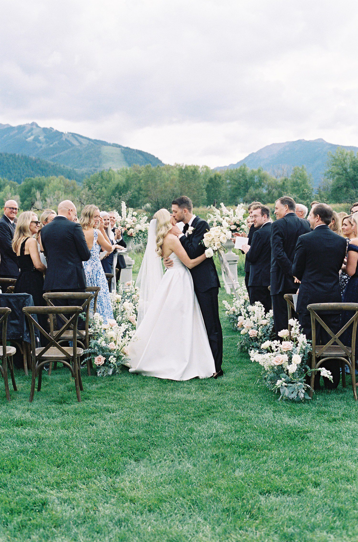 Wedding aisle kiss at Aspen Meadows Resort. 
