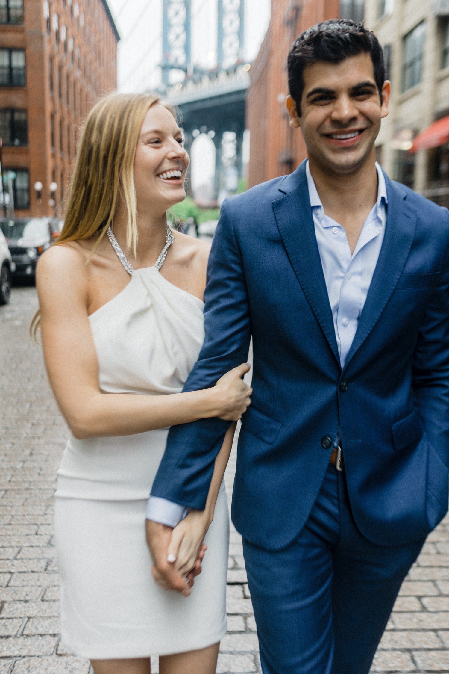 Couple walking in Brooklyn for Engagement photos. 
