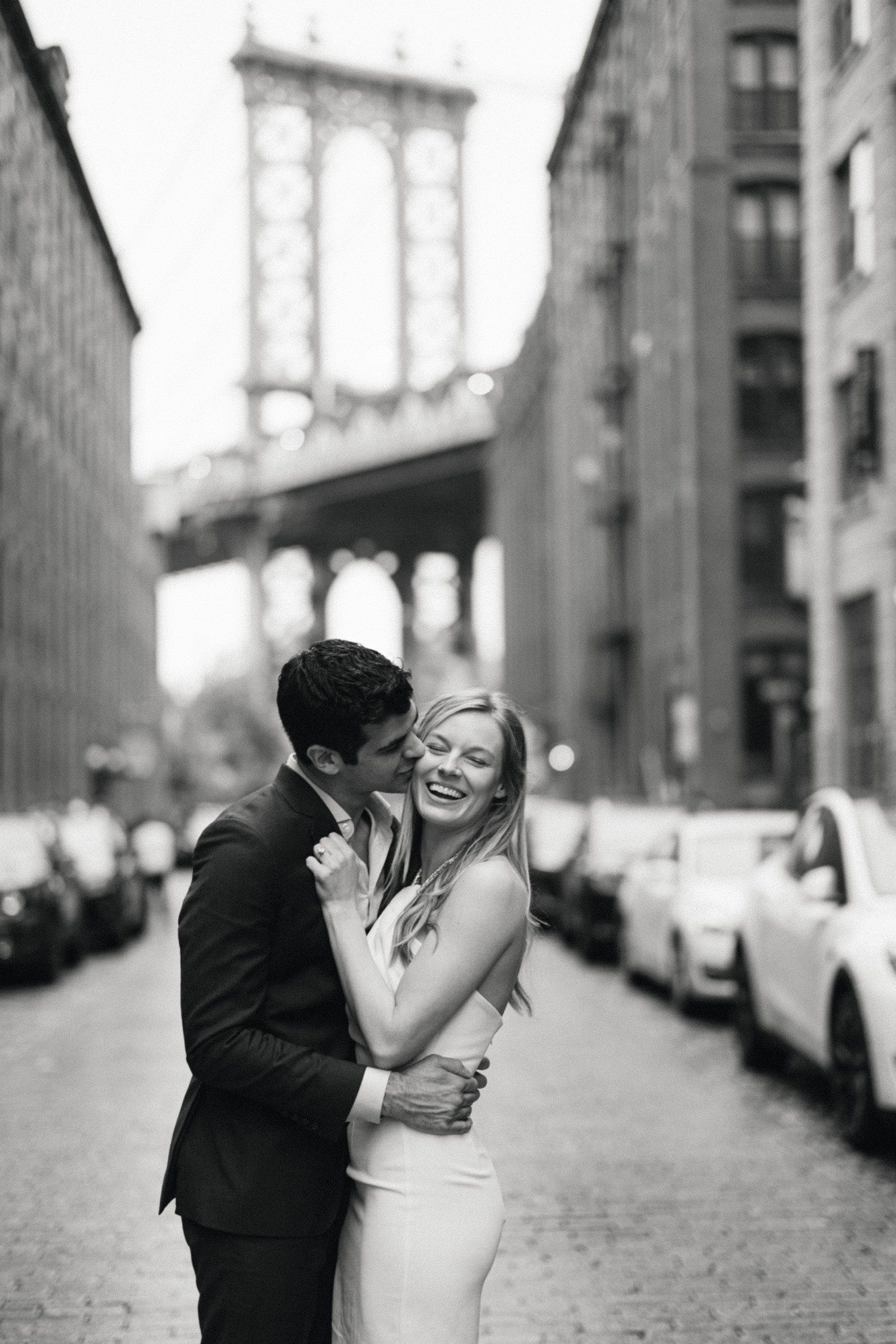 NYC engagement photos at Brooklyn Bridge.