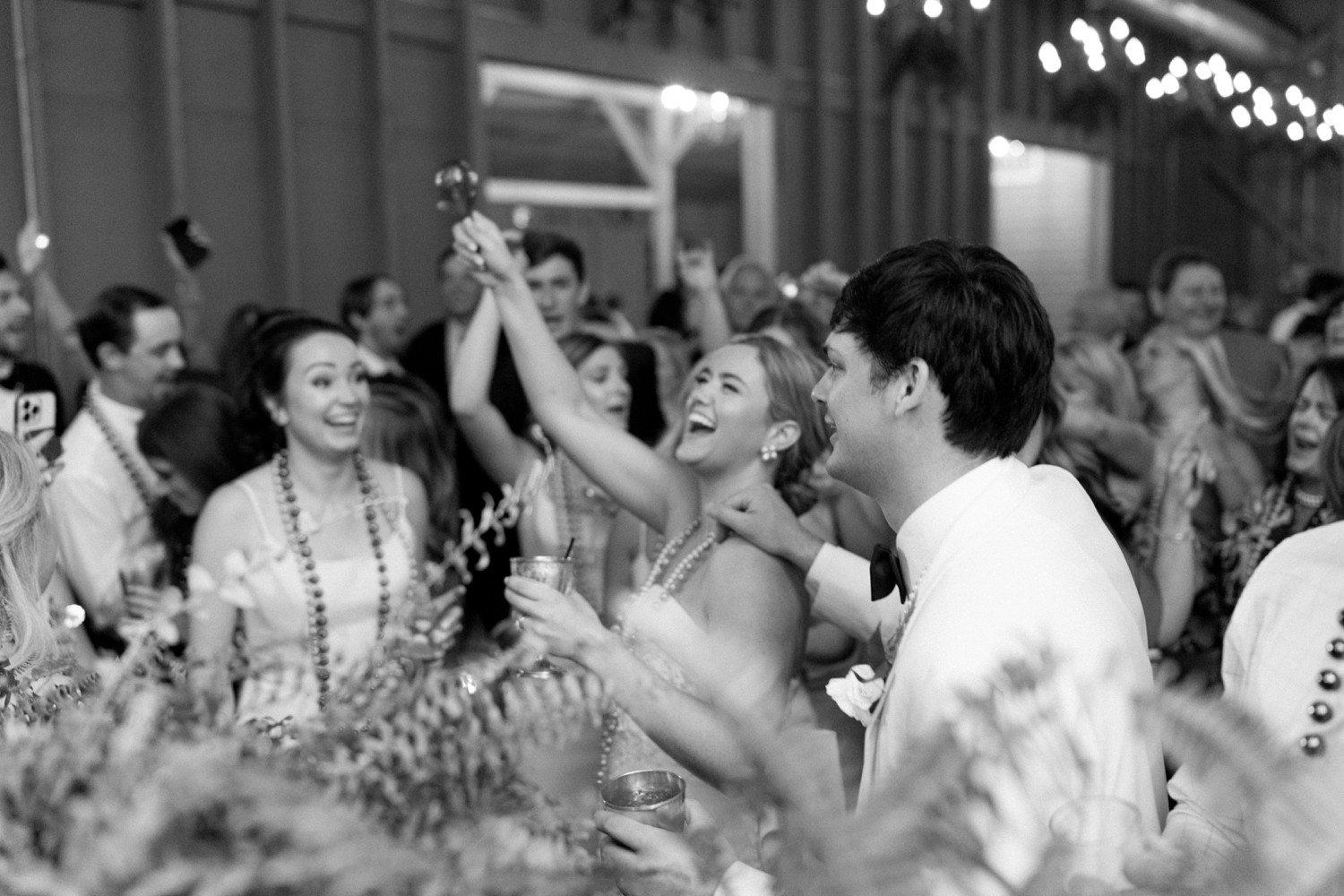 Bride and groom dancing during wedding reception at The Compound. 