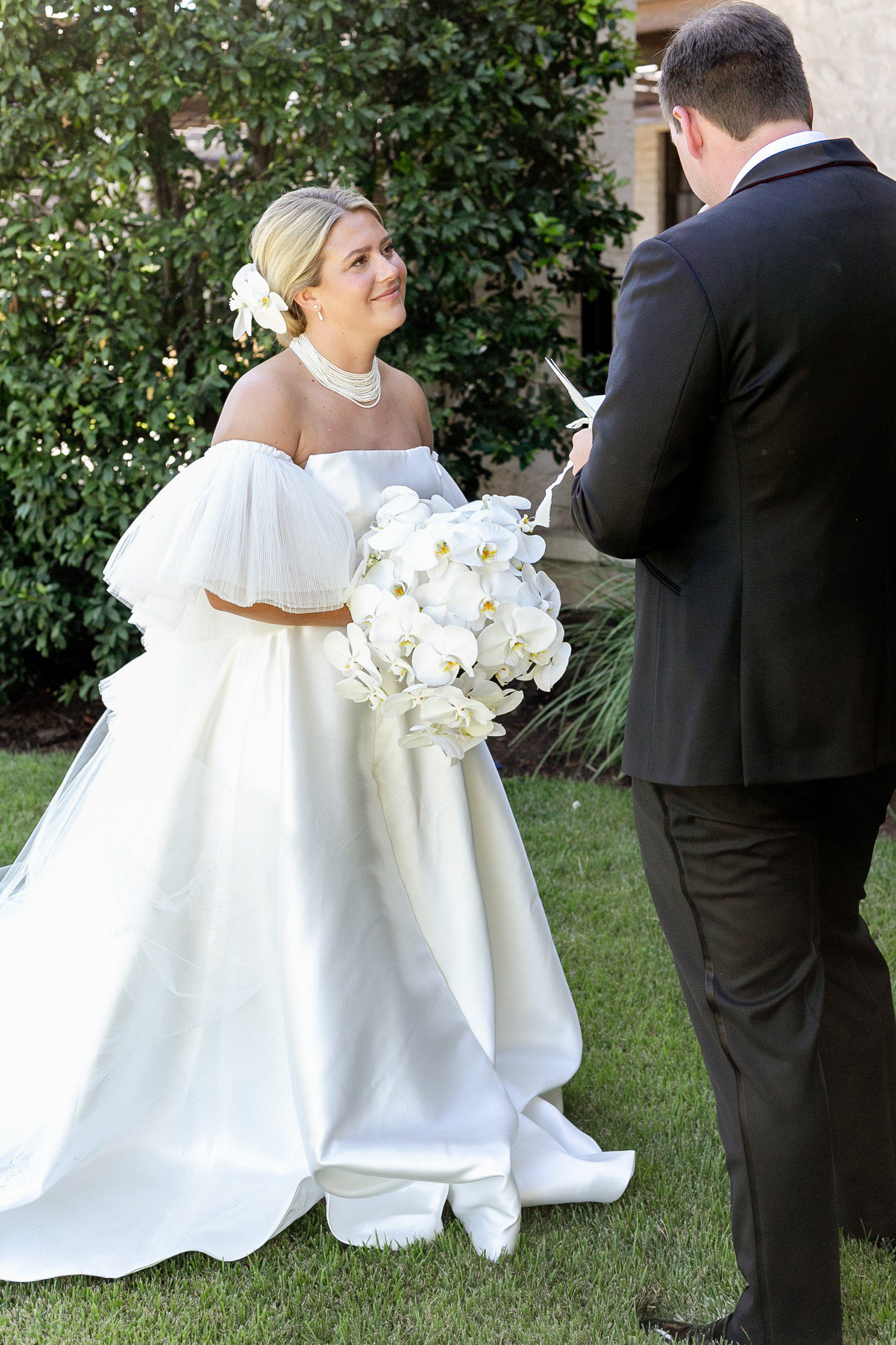 Groom reading vows to bride at Austin Country Club.