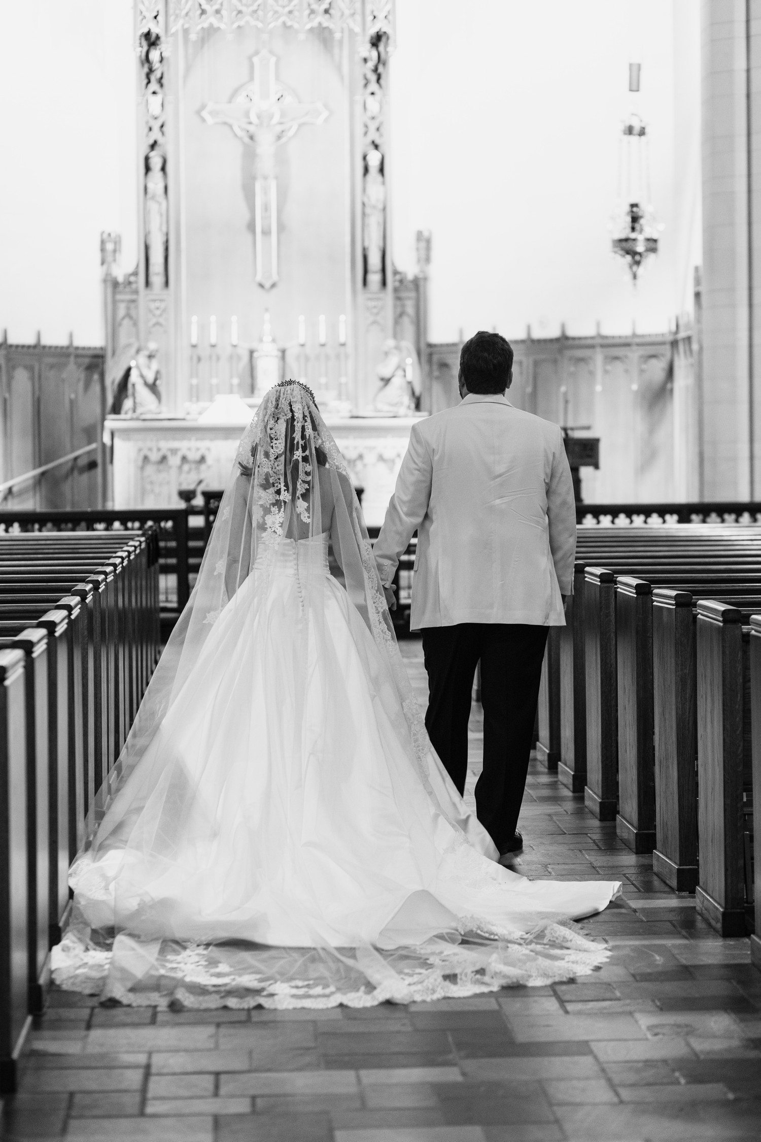 Wedding photos at Holy Rosary Church in Houston.