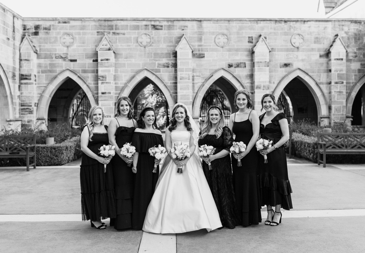 Bride and bridesmaids at Holy Rosary Church in Houston.