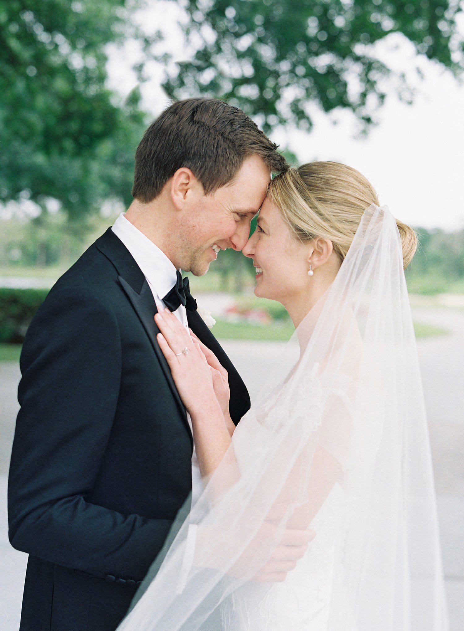 Houston Country Club wedding with bride and groom smiling at each other. 