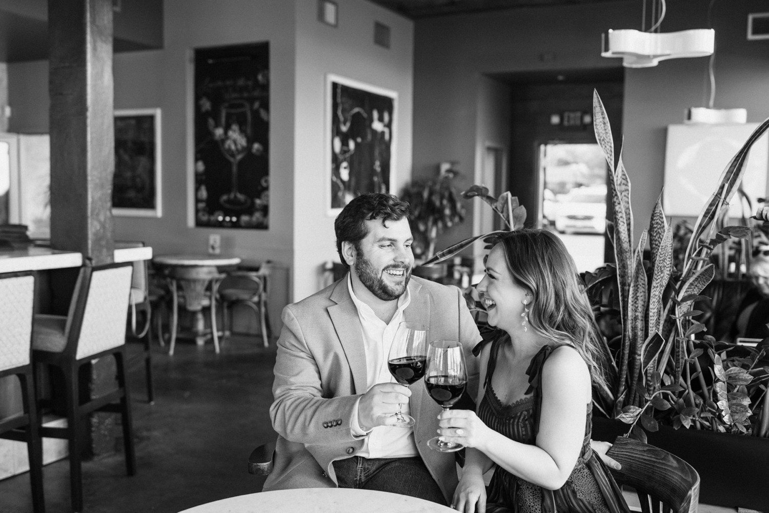 Houston Heights engagement photos with wine glasses