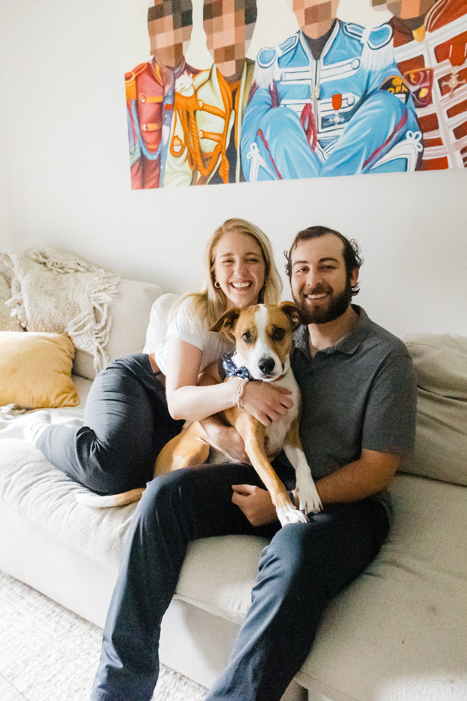 Engagement photos with dog in downtown Chicago apartment.