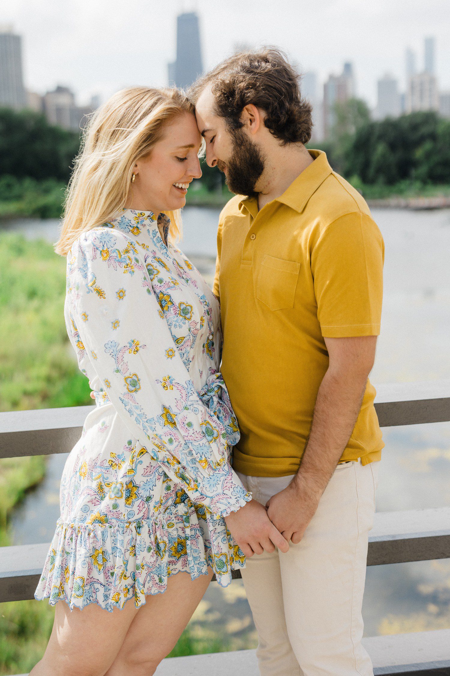 Couple forehead to forehead for engagement photos.