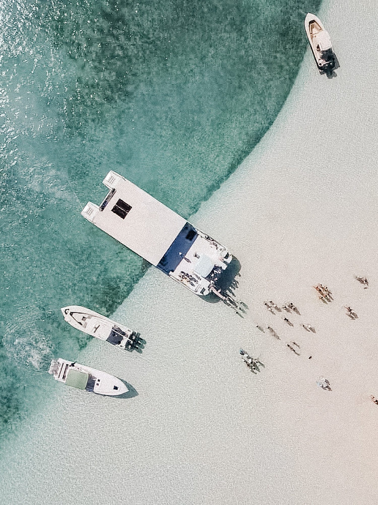 Boats on beach in the Bahamas from above