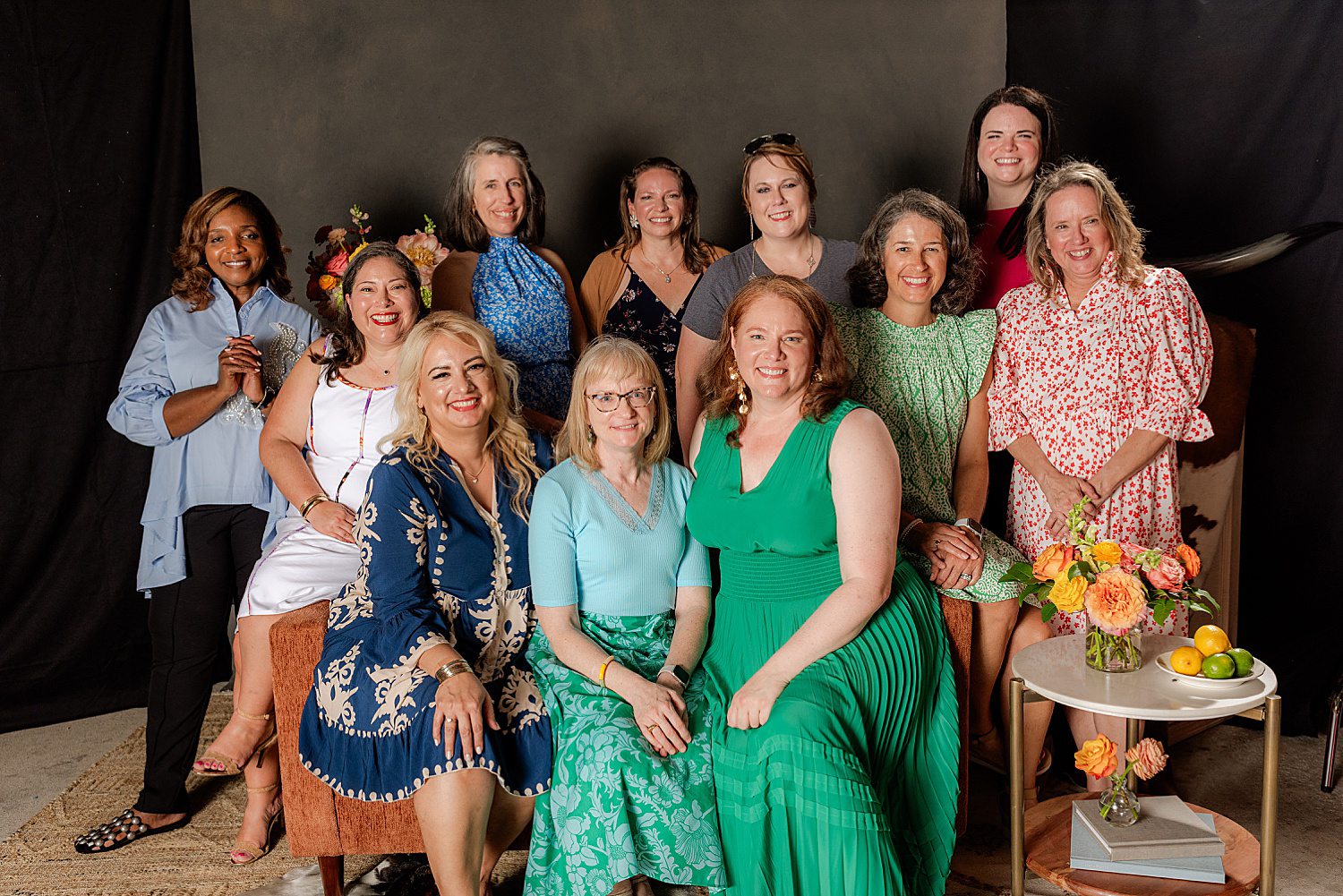 group of friends gathered for photo in luxury photo booth setting at birthday party