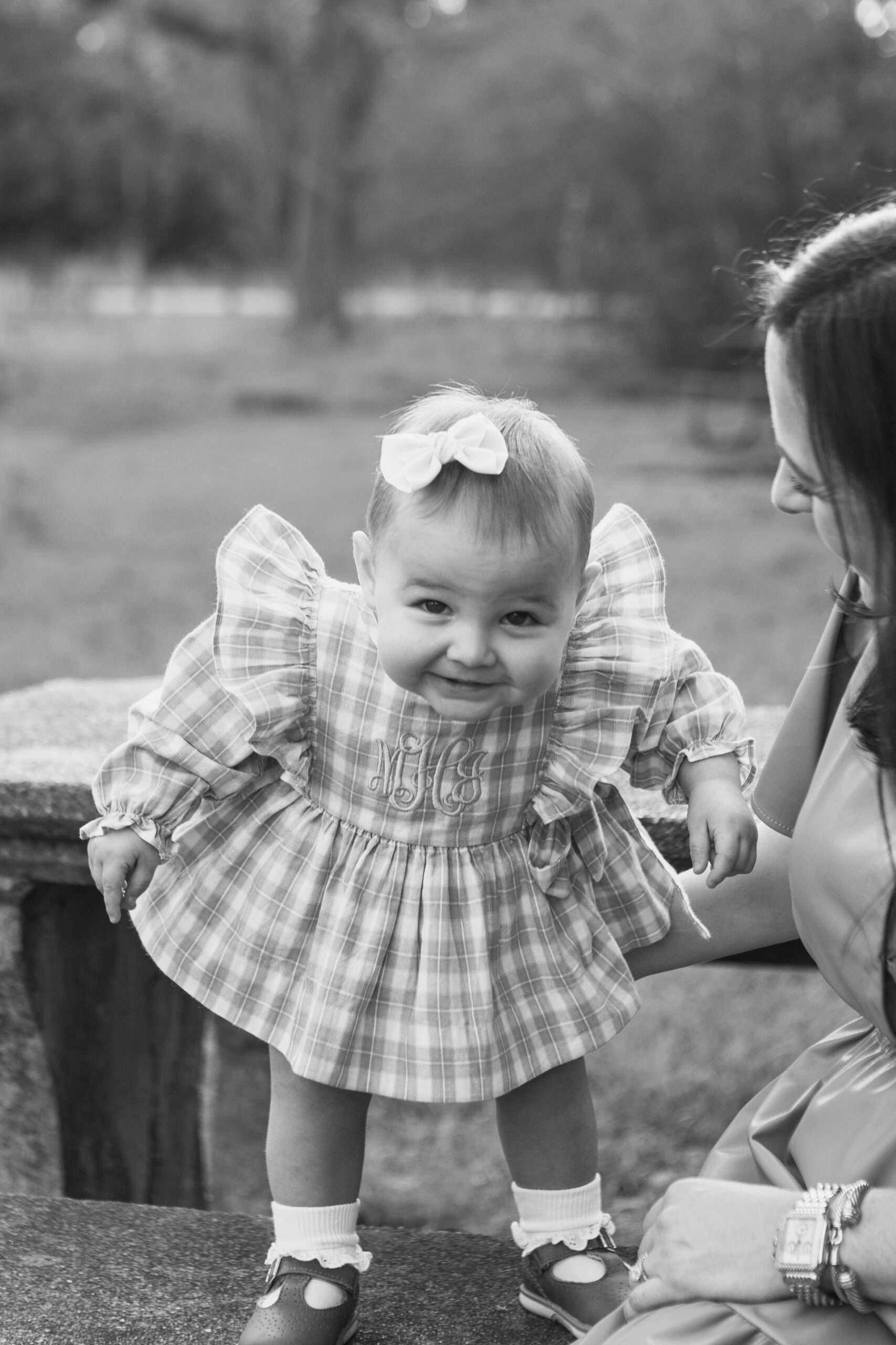 Baby girl smiling during family photos