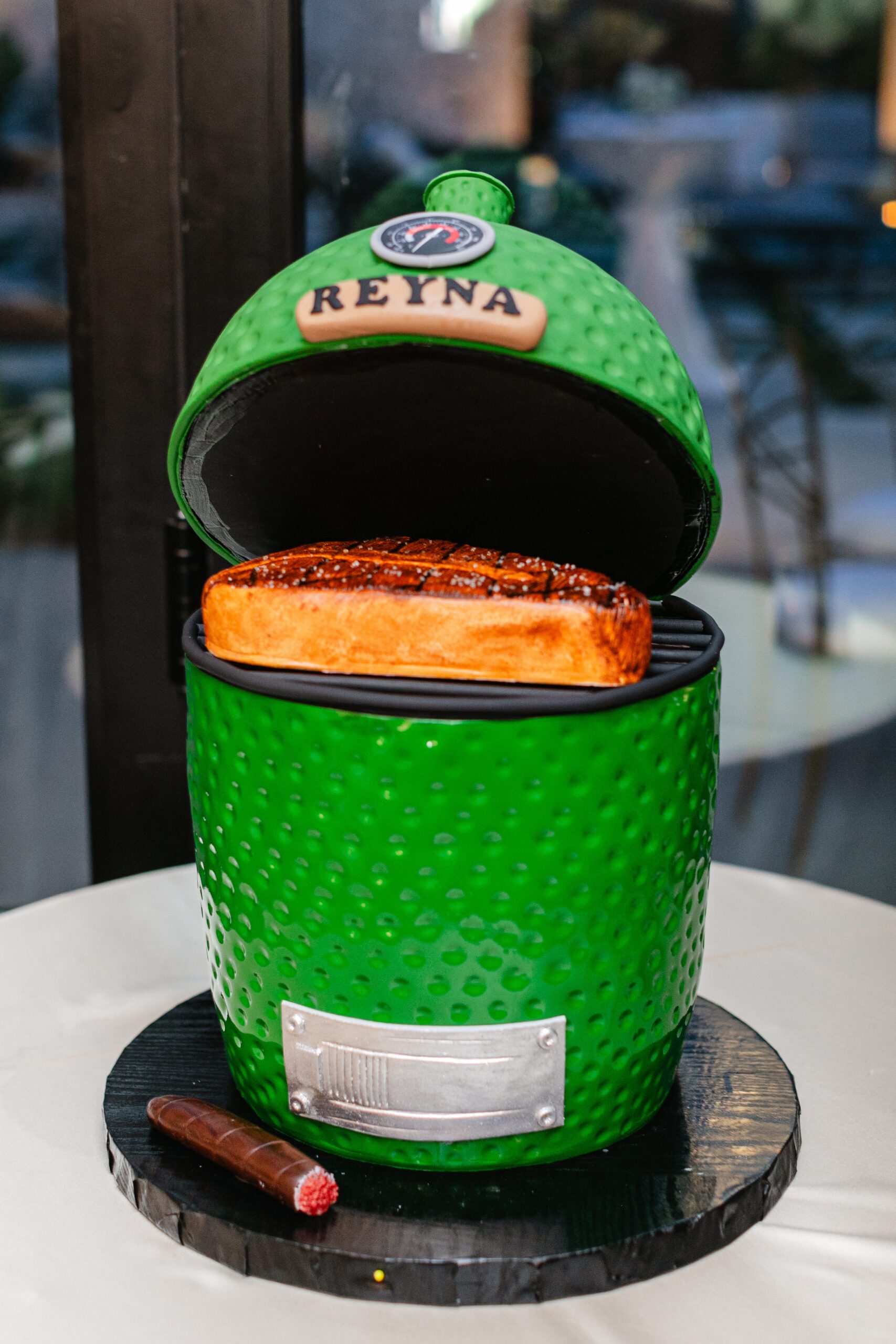 Groom's cake shaped like Green Egg smoker