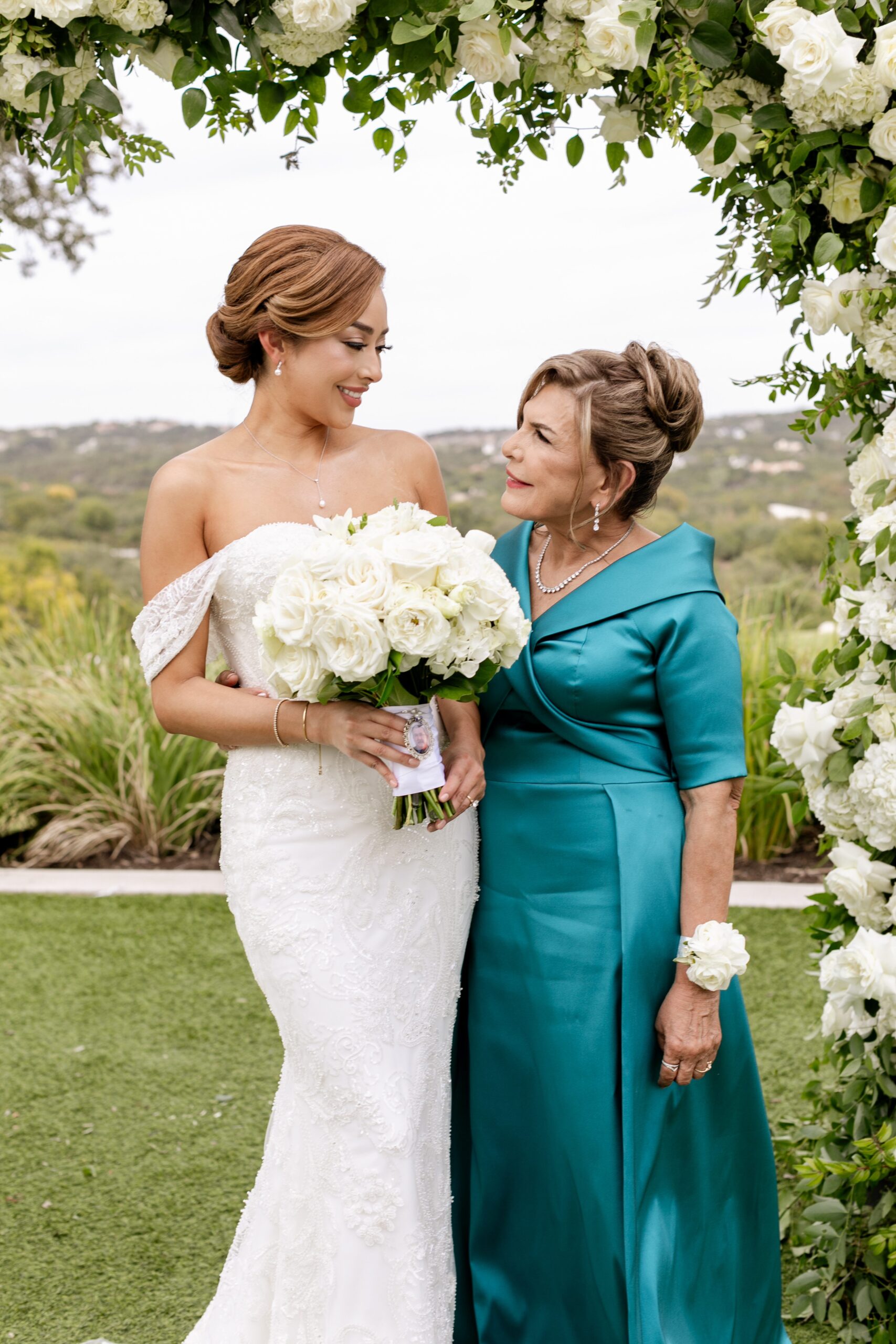 Bride with her mom at her wedding