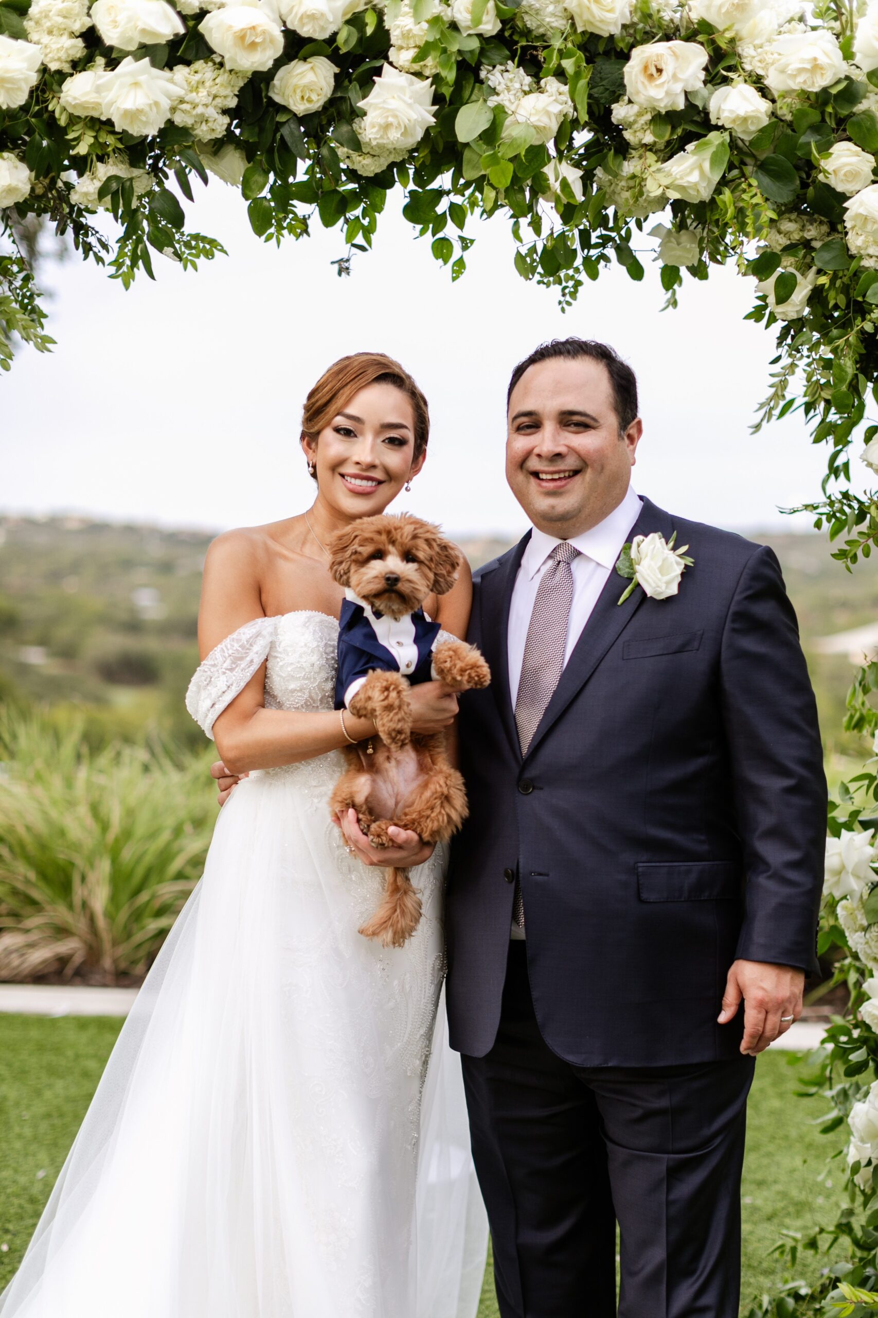 Newly married couple with their dog