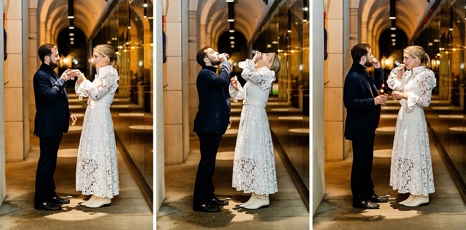 Engaged couple taking tequila shot in private moment at their Houston rehearsal dinner