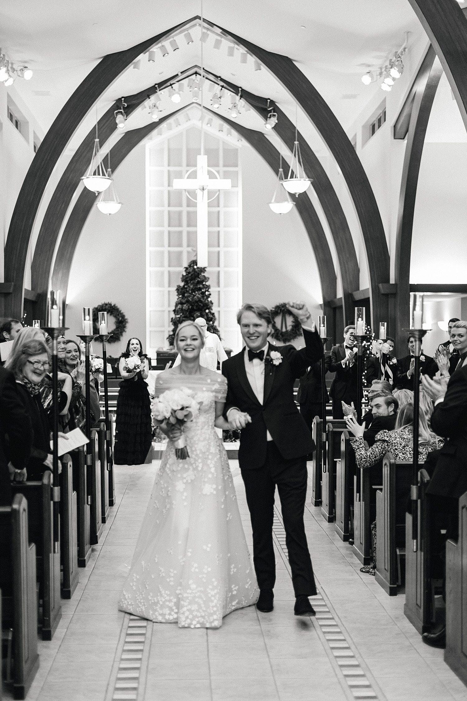 Newly married couple exiting church