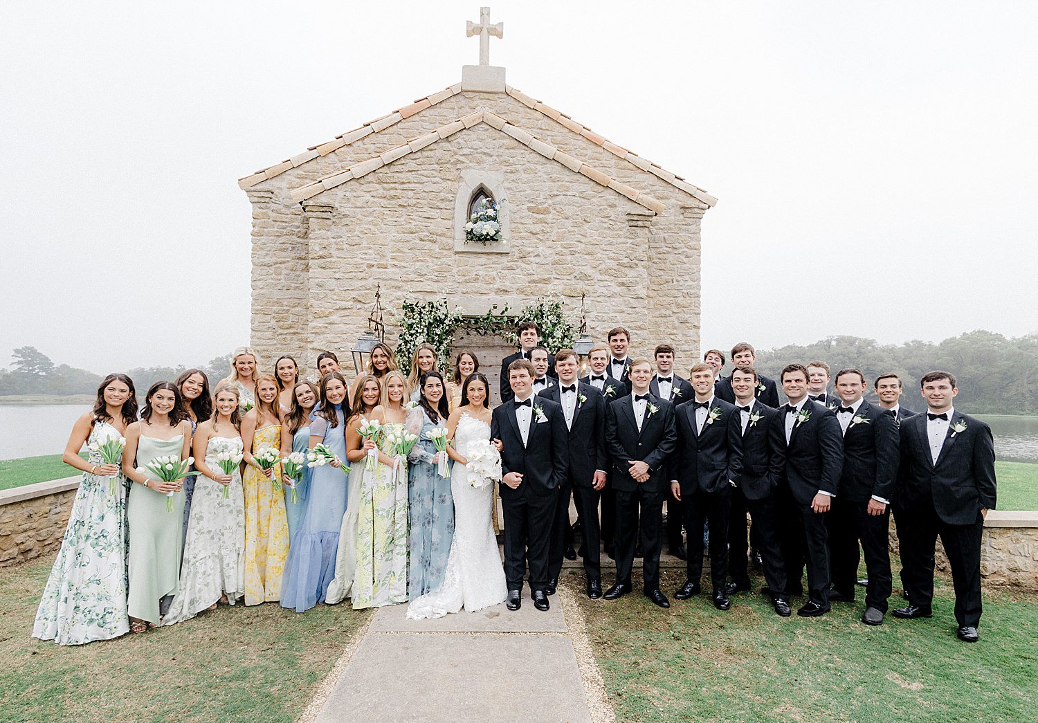 Wedding party in front of chapel