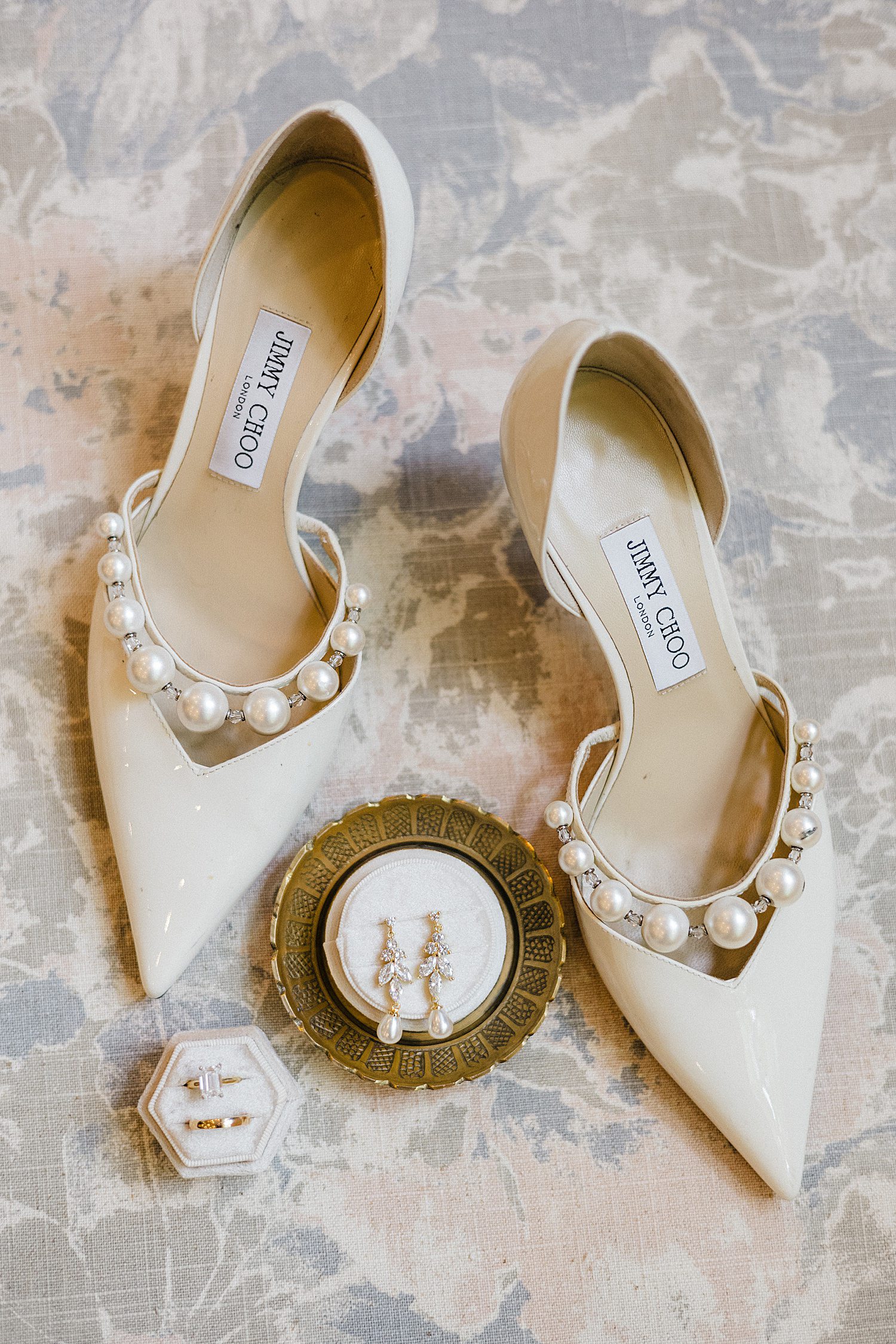 Bride's white Jimmy Choo heels with pearls